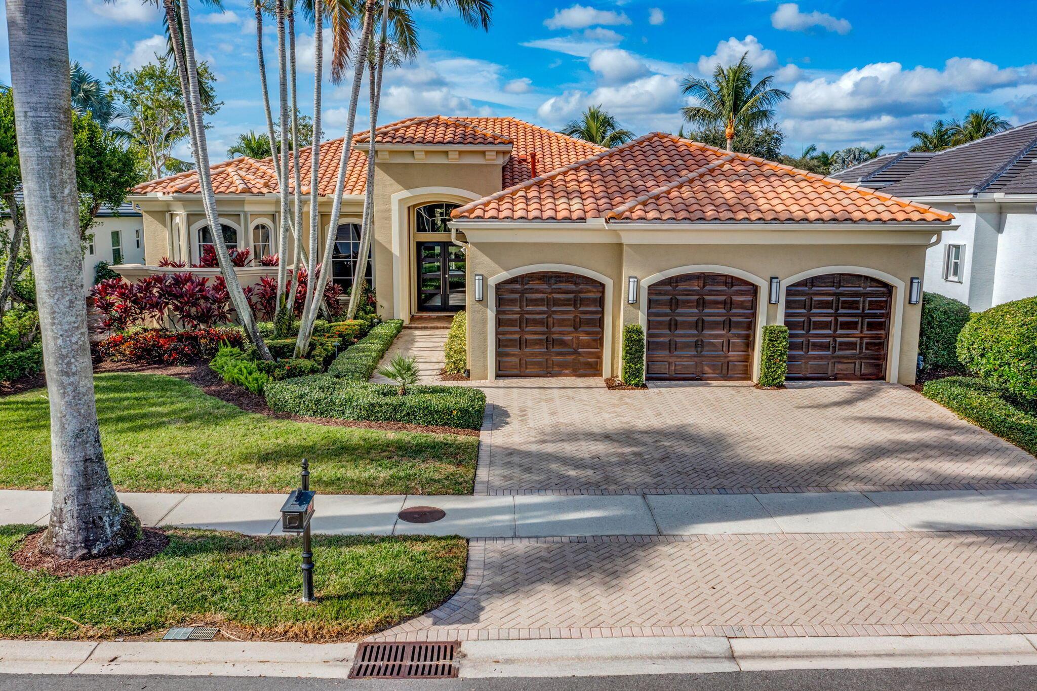 Experience luxury living in this stunning 3-bedroom, 3.5-bath home boasting over 3,400 sq. ft. of living space, a full 3-car garage, and breathtaking sunset views over a wide lake. Located in the prestigious Country Club at Mirasol, this property offers elegant design, modern upgrades, and an unbeatable lifestyle.Step inside to discover an abundance of natural light streaming through large windows in every room. The spacious family room is adorned with designer drapes and a custom-built wall unit featuring shelving and ample storage. Upgraded LED lighting enhances the ambiance throughout the home.Sports membership Experience luxury living in this stunning 3-bedroom, 3.5-bath home boasting over 3,400 sq. ft. of living space, a full 3-car garage, and breathtaking sunset views over a wide lake. Located in the prestigious Country Club at Mirasol, this property offers elegant design, modern upgrades, and an unbeatable lifestyle.

Step inside to discover an abundance of natural light streaming through large windows in every room. The spacious family room is adorned with designer drapes and a custom-built wall unit featuring shelving and ample storage. Upgraded LED lighting enhances the ambiance throughout the home.

The beautifully updated kitchen is a chef's dream, featuring contemporary cabinetry with under-counter lighting, a waterfall-edge quartz countertop, a glass tile backsplash, and a stainless steel farmhouse sink. High-end appliances include a 4-burner gas range, LG refrigerator with an icemaker, and a double oven with microwave convection functions.

The primary suite is a private retreat, showcasing updated porcelain tile, a large walk-in shower with a seamless enclosure, upgraded Kohler vessel sinks, and a freestanding tub. Custom-built closets and an oversized bedroom with serene water views and patio access complete this exceptional space.

The updated powder room is a standout, featuring porcelain tile floors, a striking glass-tile accent wall, a lighted mirror, additional mirrors, and a stylish vessel sink.

Two guest suites offer warm wood flooring, private baths, and generous closet space, providing comfort and privacy for family and visitors alike.

Outdoors, enjoy the serene lake views from your expansive patio, perfect for entertaining or relaxing by the pool and spa. 

Additional features include crown molding throughout, porcelain tile laid on a diagonal, an LG washer/dryer combination, a mix of impact sliders and accordion shutters.  Sports Membership to Mirasol's exclusive amenities including tennis, pickleball and golf.  

This exquisite property combines elegance, comfort, and functionality in one of Palm Beach County's premier communities. Don't miss your chance to make it your dream home!