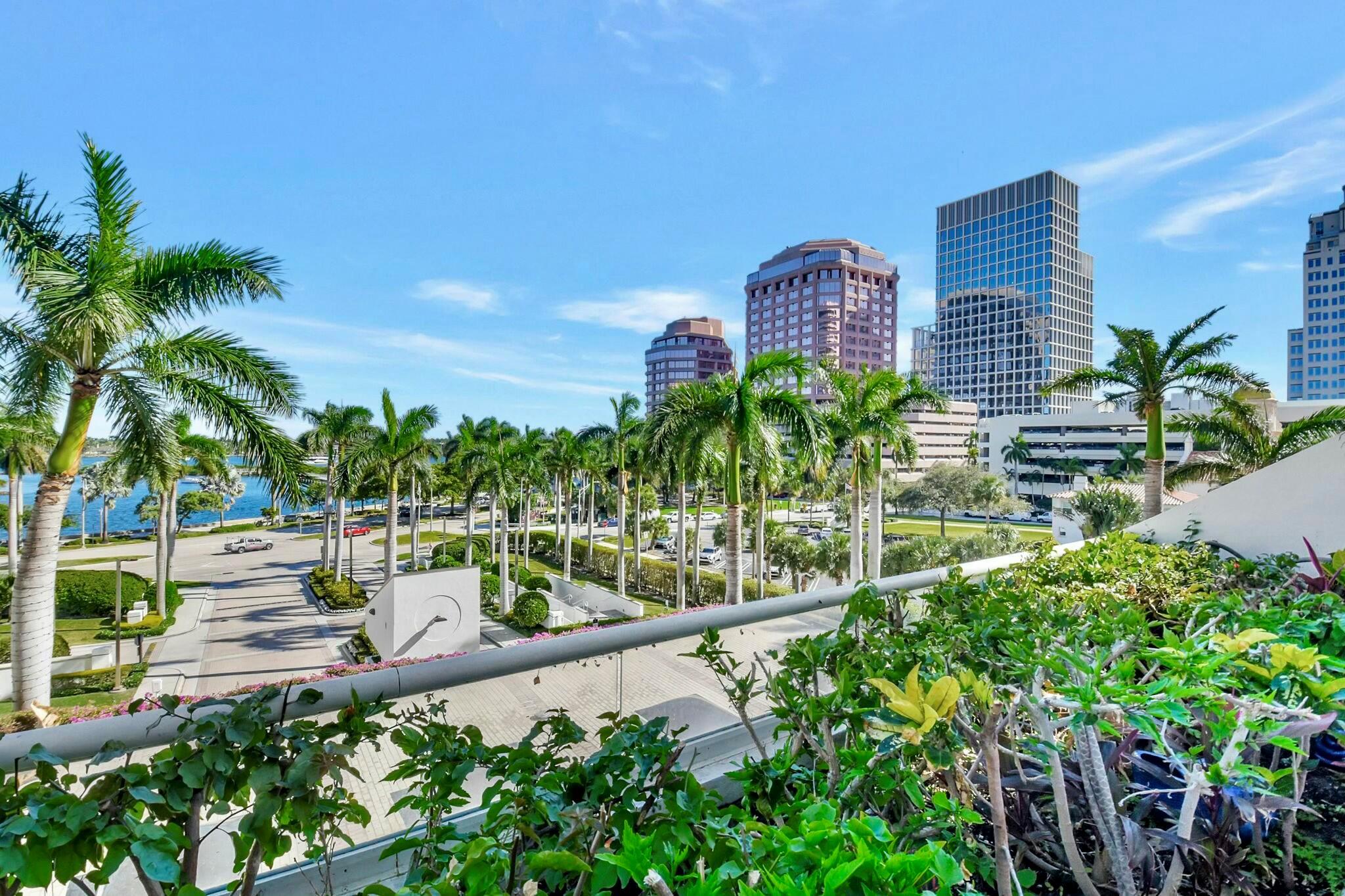 Welcome to Residence TH4F at The Plaza of the Palm Beaches! This 4,187 sq. ft. 2-story townhome offers 3 bedrooms, 3.5 bathrooms, a family room, and a 600+ sq. ft. private terrace with breathtaking Intracoastal views. The living room and eat-in kitchen boast double-height ceilings and floor-to-ceiling windows. The new kitchen features granite countertops and custom cabinetry. The grand master suite includes a private balcony, soaking tub, dual vanities, and walk-in closets. Other highlights: marble flooring, private elevator foyer, wet bars, ample storage, and a laundry room. Residents enjoy 24-hour doorman, valet, concierge, fitness center, pools, tennis, and a prime location near world-class shopping and dining. Experience luxury waterfront living at its finest!