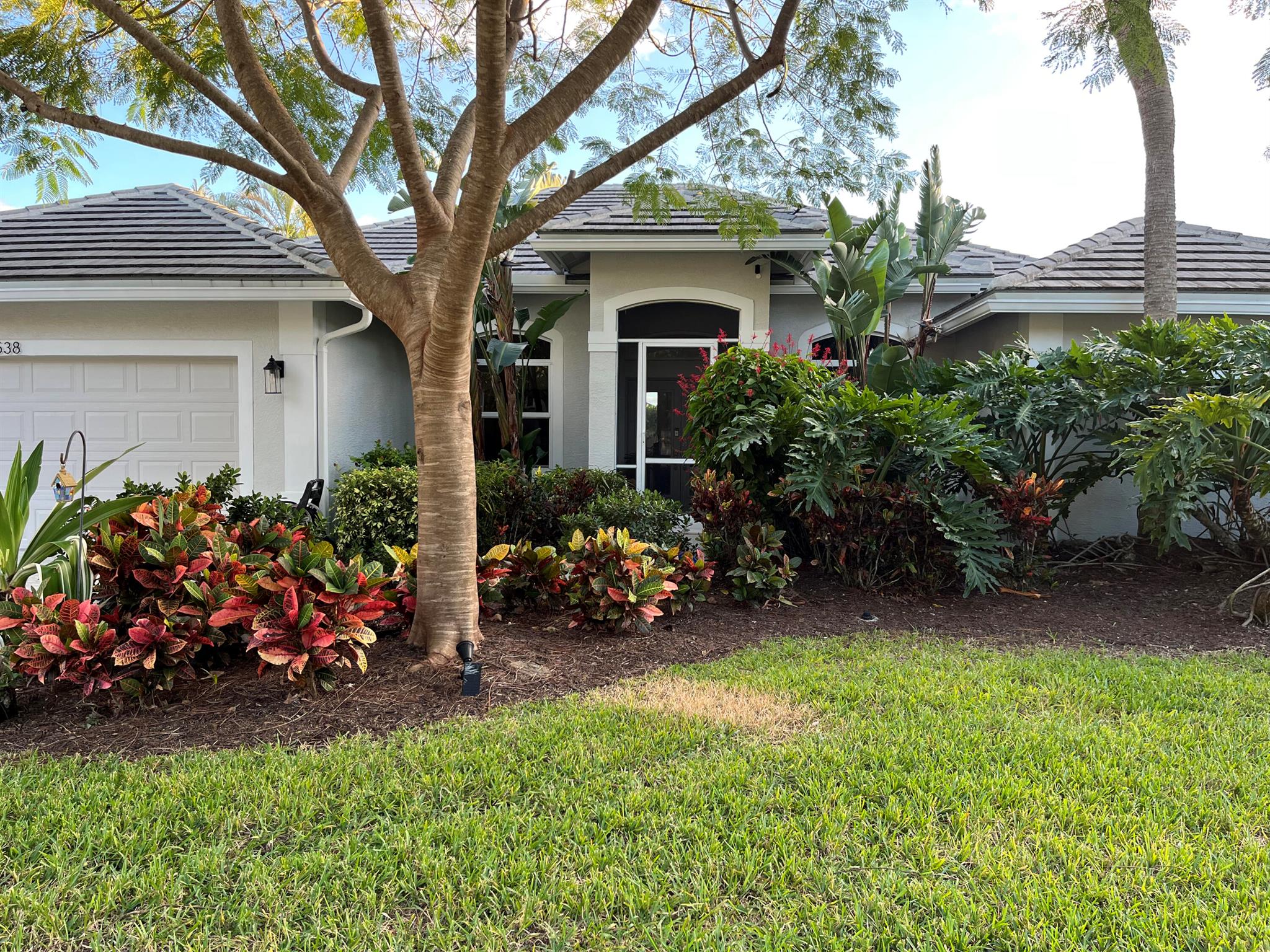 Egret Landing, Desirable one story living! This rare piece of property has been meticulously maintained by the original owner. Exterior walls are 10' to accommodate the volume ceilings.  New 4' built in, panel ready fridge, Bosch appliances, custom kitchen, granite countertops . Impact glass, 2022 roof, 2023 AC in main house & mini split in-law suite. Guest Suite/income op has private entrance, 8'0 sliding doors overlooking the pool, new appliances, washer/dryer, full bath and 9' ceilings.Main house boasts 32'' porcelain, zero grout tile, open concept, freshly painted interior and exterior,  expansive 8'0 sliders, new hot tub, new pool pump, pool tile, additional insulation including garage..much more!  A MUST SEE!Agent has full list of upgrades and additions  added to this home