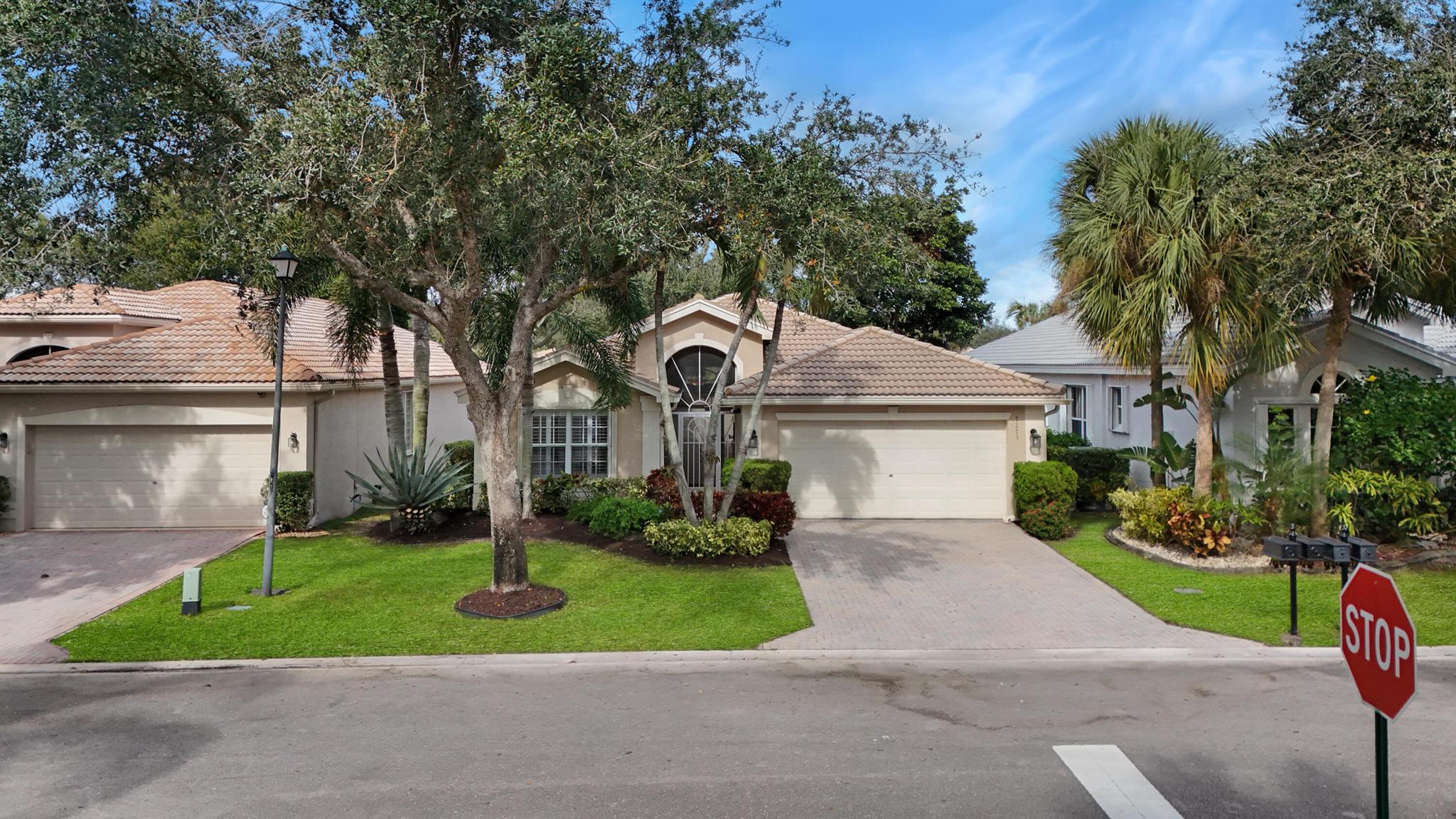 Welcome to 7273 Kea Lani Drive, a stunning 3-bedroom, 2-bath home in Boynton Beach's desirable 55+ Valencia Isles. This South Pacific model is bright and airy featuring a spacious open layout, a chef's kitchen with a quartz topped center isle and a breakfast nook overlooking the lush private backyard. The master suite offers a spa-like en-suite with his and hers walk-in closets.  Plantation shutters and high hat lighting are throughout the home. Featuring a private backyard with lush landscaping and a screened in lanai creating a serene retreat.  Accordion Shutters for Storm Protection.Enjoy resort-style amenities, including a newly renovated clubhouse, pools, pickleball,  tennis courts, and fitness center. Close to dining, shopping, and beaches--schedule your private showing today!!