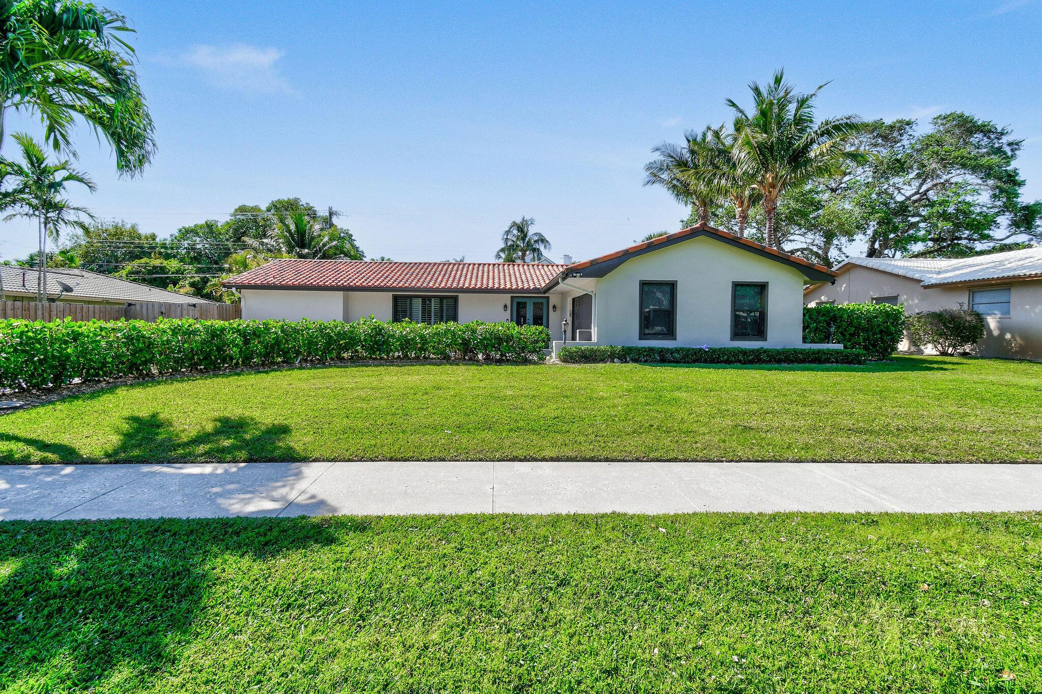 Experience the charm of coastal living with this beautifully renovated home in the picturesque community of Juno Isles. This move-in-ready CBS construction residence offers 4 bedrooms, 2 bathrooms, and a sparkling heated pool, along with a spacious 2-car garage featuring epoxy flooring. Every detail of this home has been thoughtfully remodeled, including a gourmet kitchen outfitted with sleek appliances and elegant finishes, making it a true chef's dream. Established in the 1960s, Juno Isles is celebrated as one of Palm Beach County's hidden gems. This community offers a welcoming atmosphere free from restrictive HOA rules, combining a laid-back lifestyle with modern convenience. Ideally positioned between US1 and the Intracoastal Waterway, it delivers both accessibility and a tranquil ambiance. The home features full impact glass windows, providing added safety, energy efficiency, and peace of mind. Less than 10 minutes from the iconic Juno Pier, this location offers unparalleled access to South Florida's premier beaches, outdoor adventures, and marine activities. 2036 Ardley Road is a refined yet understated property in an unbeatable location, presenting a rare opportunity to live in one of South Florida's most sought-after enclaves. Don't miss your chance to make this exceptional home your own.