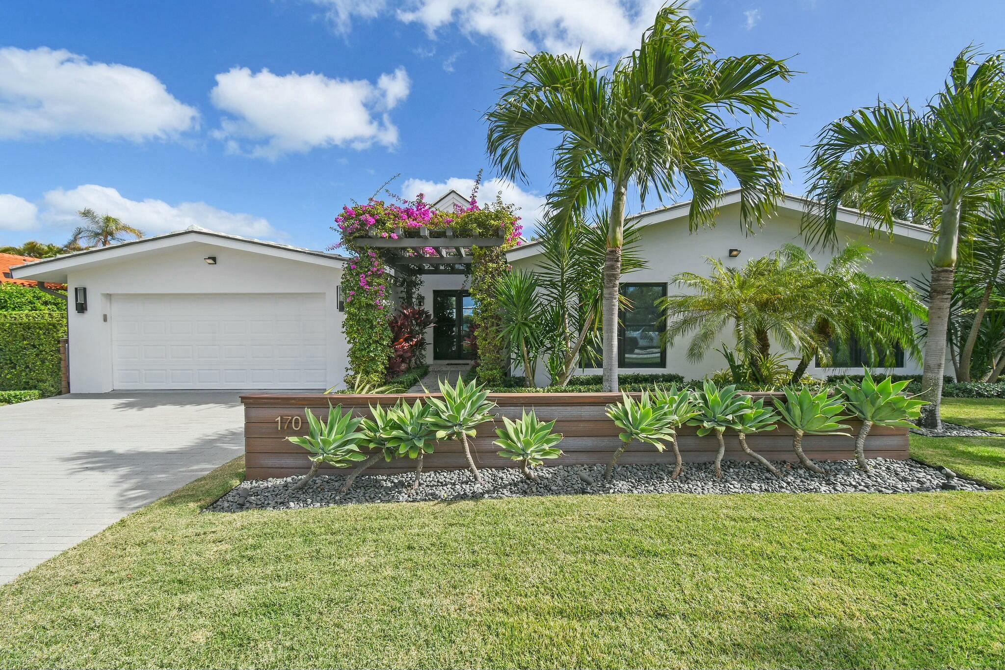 Welcome to your dream home, just steps from the beach in beautiful Jupiter Inlet Colony. This tastefully renovated 4-bedroom, 3.5-bathroom residence features a versatile den, perfect for a home office or extra guest space. As you arrive, you're greeted by a stunning bougainvillea-draped atrium entrance, setting the tone for the tropical oasis within. Inside, the wide-open living space impresses with soaring volume ceilings, gleaming marble floors, and an abundance of natural light. The heart of the home is the open chef's kitchen, complete with a wine cooler, oversized counters, and high-end finishes--ideal for entertaining or quiet family evenings. The primary suite offers a tranquil retreat, featuring custom doors that open to your own private garden. Indulge in the luxurious Zen- inspired spa bathroom, boasting a freestanding tub, sleek finishes, and Kolbe impact windows for style and safety. Step outside to enjoy the sparkling pool, surrounded by lush, tropical landscaping that offers both beauty and privacy. 170 Beacon Lane embodies the Florida lifestyle, with every detail designed for comfort and sophistication. Don't miss this opportunity to live in Jupiter Inlet Colony, where the beach, beauty, and convenience come together in perfect harmony. 
NOTE: 4th bedroom (double bunk room) has no closet, and therefore is technically not a legal Florida bedroom. At a minimal cost, a closet could be added.