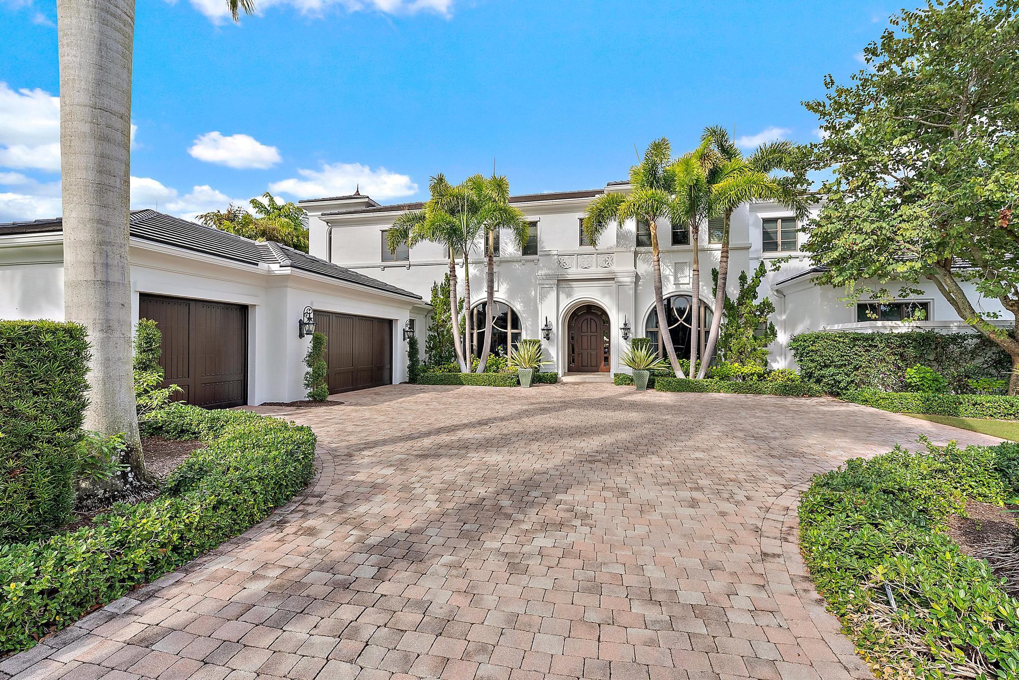 Step into a masterpiece of design and sophistication, located in the exclusive Old Palm Golf Club in Palm Beach Gardens, Florida. This custom-built estate is a testament to luxurious living, offering five bedrooms, private office, club room, and an owner's lounge, seven and a half bathrooms, and 6,595 square feet of thoughtfully curated living space. Every detail has been meticulously crafted to create a seamless blend of elegance and comfort, perfectly suited for the South Florida lifestyle.The first-floor primary suite is a true retreat, featuring his and her bathrooms, a private study with tranquil water and fire feature views, and direct access to the serene outdoor living areas. An additional guest suite and a versatile club room are also conveniently located on the first floor, providing privacy and entertainment options for family and friends. The home is equipped with an elevator, ensuring effortless access to all levels.

The gourmet chef's kitchen is fully equipped with dual islands, dual dishwashers, a coffee bar setup, and luxurious finishes, making it perfect for entertaining. Wine enthusiasts will appreciate the temperature-controlled wine cellar, ideal for storing and showcasing an extensive collection.

The expansive family room opens to an outdoor screened living space through massive pocket doors, creating the ultimate setting for indoor-outdoor living. A wet bar with an ice maker enhances the entertaining experience. The outdoor area features a fully equipped kitchen, a double-sided fireplace, a sparkling pool and spa, and a beautifully landscaped garden.

Additional highlights include a brand-new roof, luxurious finishes throughout, a three-car garage with additional space for a golf cart, and unparalleled craftsmanship. Old Palm Golf Club is a renowned gated community with a newly renovated clubhouse, a state-of-the-art fitness center, a Raymond Floyd designed championship golf course, private dining options, and a club room for relaxing after a round of golf.

This prime location is just minutes from world-class dining, Palm Beach Island, pristine beaches, and airport access. Perfectly priced to sell, this property offers exceptional value for its next owner to enjoy the ultimate South Florida lifestyle.