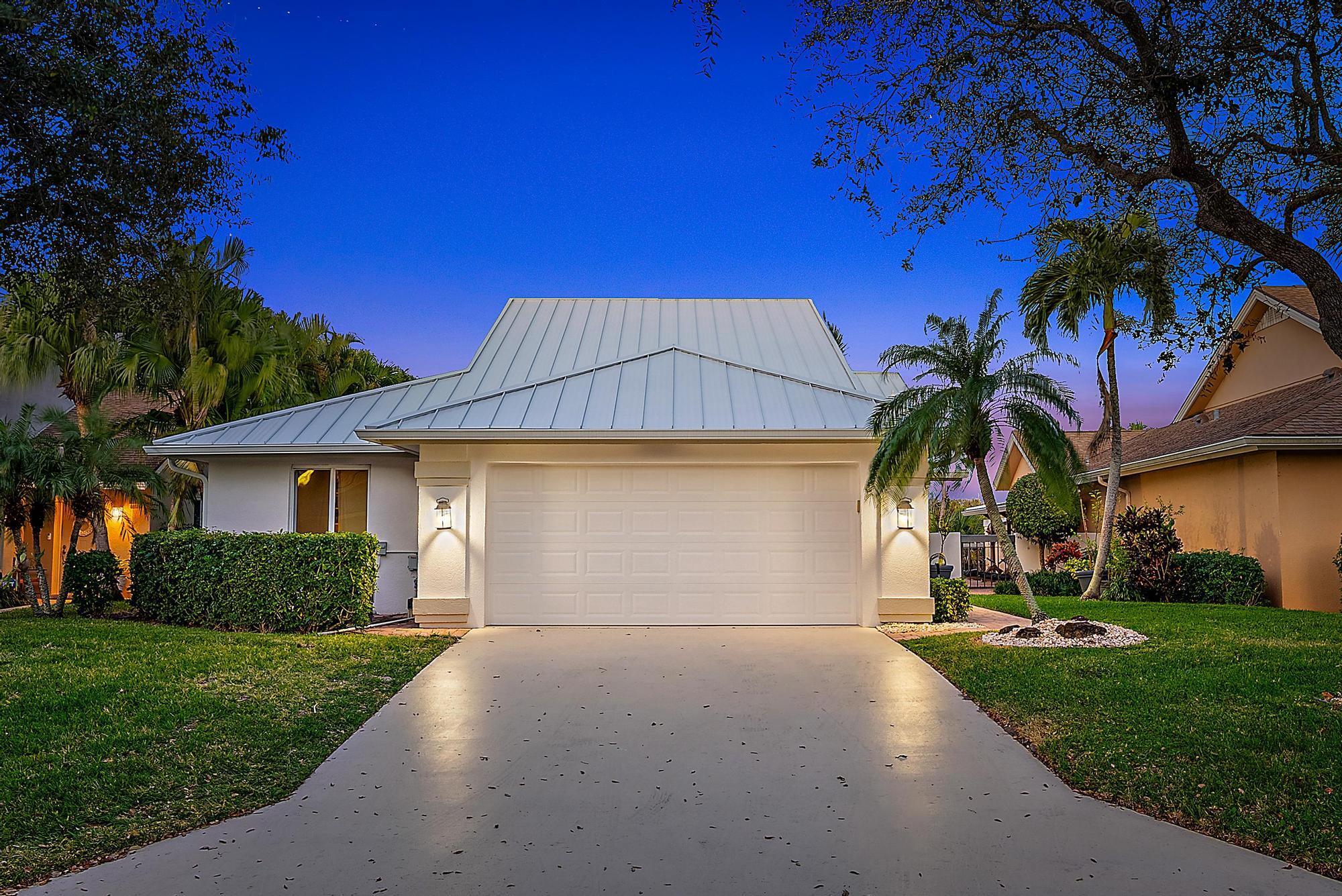 EXQUISITE, completely renovated single-family home offering 3 bedrooms + loft, 2 bathrooms, and 2,123 square feet of luxurious living space. Nestled on a private lot backing up to a tranquil preserve, this home features a stunning saltwater pool and is located just a 5-minute walk from Jupiter's renowned beaches and pier. With a new metal roof, hurricane-impact windows and doors, and high-end finishes throughout, this green home combines modern luxury with eco-conscious living.As you step inside, you are greeted by a bright and open living space with high vaulted ceilings, fresh LED lighting, and elegant tile flooring throughout. The custom wood and glass staircase leads to a versatile loft space, perfect as a home office or additional bedroom. The heart of the home is the chef's kitchen, featuring custom cabinetry with soft-close drawers, white marble countertops, a decorative tile backsplash, floating shelves and a spacious island with seating for six. Top-of-the-line appliances, including Miele induction stove and dishwasher, and Gaggenau wall oven, steamer, and split fridge/freezer, elevate the culinary experience. A kitchen window invites natural light, creating a warm and inviting atmosphere.

The primary suite is a true sanctuary, with sliding glass doors opening to the pool and eastern-facing views for breathtaking sunrises. The suite includes custom California-built closets, including a large walk-in. The primary bath boasts a double vanity with quartz countertops, a frameless shower with floor-to-ceiling tile and dual showerheads.

The home also offers two spacious guest bedrooms, each with built-in closets, and a beautifully renovated guest bathroom featuring a walk-in shower with floor-to-ceiling tile.

The outdoor space is a private oasis, complete with a saltwater pool, outdoor shower, and lush turf grass. A paddleboard and canoe rack provides convenient storage for water sports enthusiasts, while new gutters and a metal roof with double insulation ensure durability and peace of mind.

Additional features include a mini-split AC system in the garage, central vacuum, a reverse osmosis water filtration system, and newer AC and water heater. This green home was meticulously renovated using non-toxic materials and no plastic, making it both sustainable and luxurious.

The community offers resort-style amenities, including an Olympic-sized pool, tennis and pickleball courts, basketball courts, a dog park, a clubhouse, and a playground, all with a low monthly HOA fee.

Located in the heart of Jupiter, this home is just minutes from fine dining, boutique shopping, and the iconic dog beach.

Don't miss this opportunity to own your dream home&#x14;schedule your private tour today!