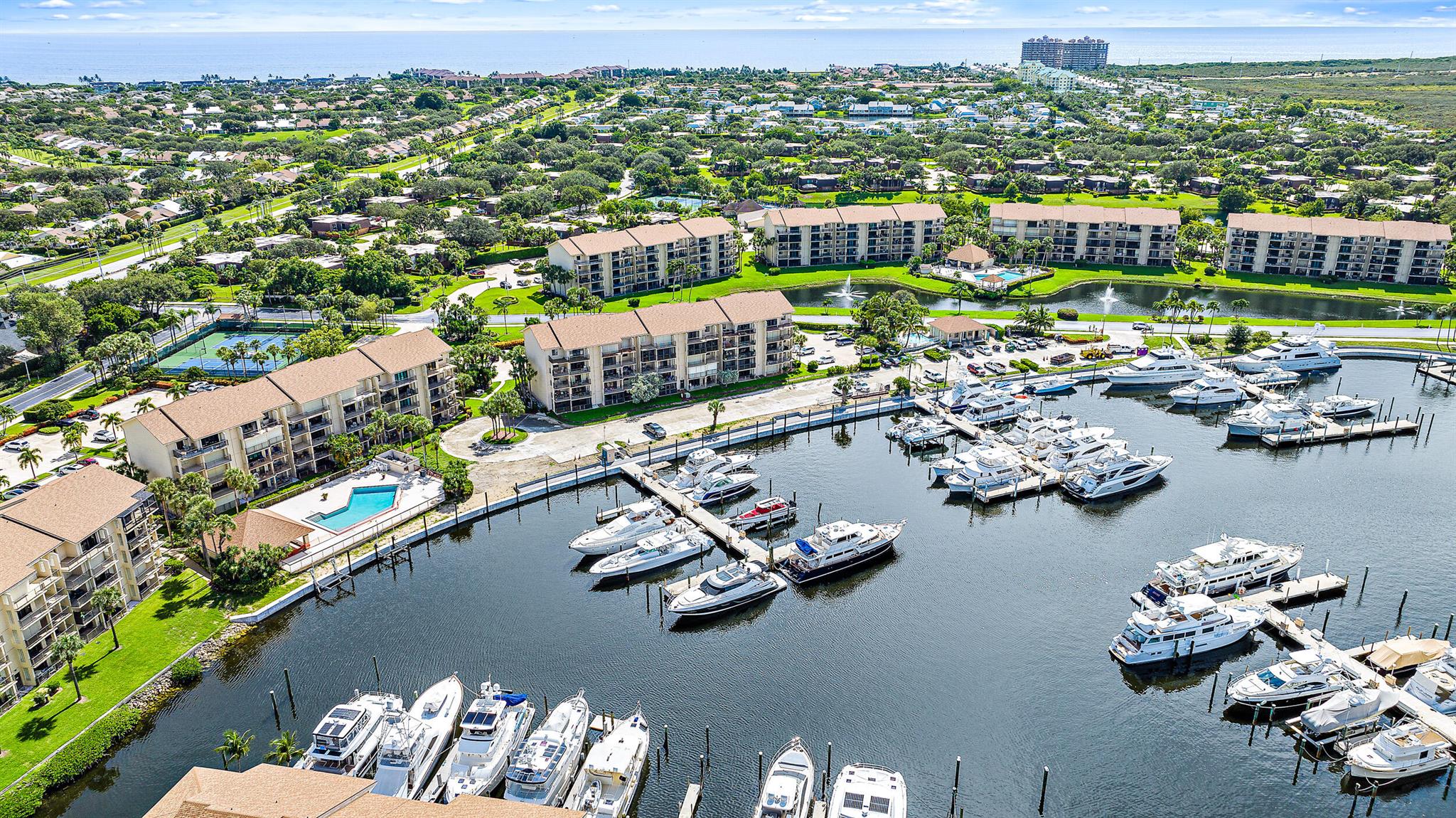 Nestled directly on the Intracoastal Waterway & surrounded by stunning multi-million-dollar waterfront estates, this exceptional property offers the luxury lifestyle you've always dreamed of--without the hefty price tag. Relax & unwind on your expansive patio as yachts glide by & take in the breathtaking panoramic views from this fully renovated 2-bedroom, 2-bathroom home with a bonus room featuring a Murphy bed. Every detail of this property has been thoughtfully updated with impact glass throughout, beautiful flooring, sleek stainless-steel appliances, & elegant granite countertops. The screened-in patio offers a perfect spot to enjoy the outdoors year-round.