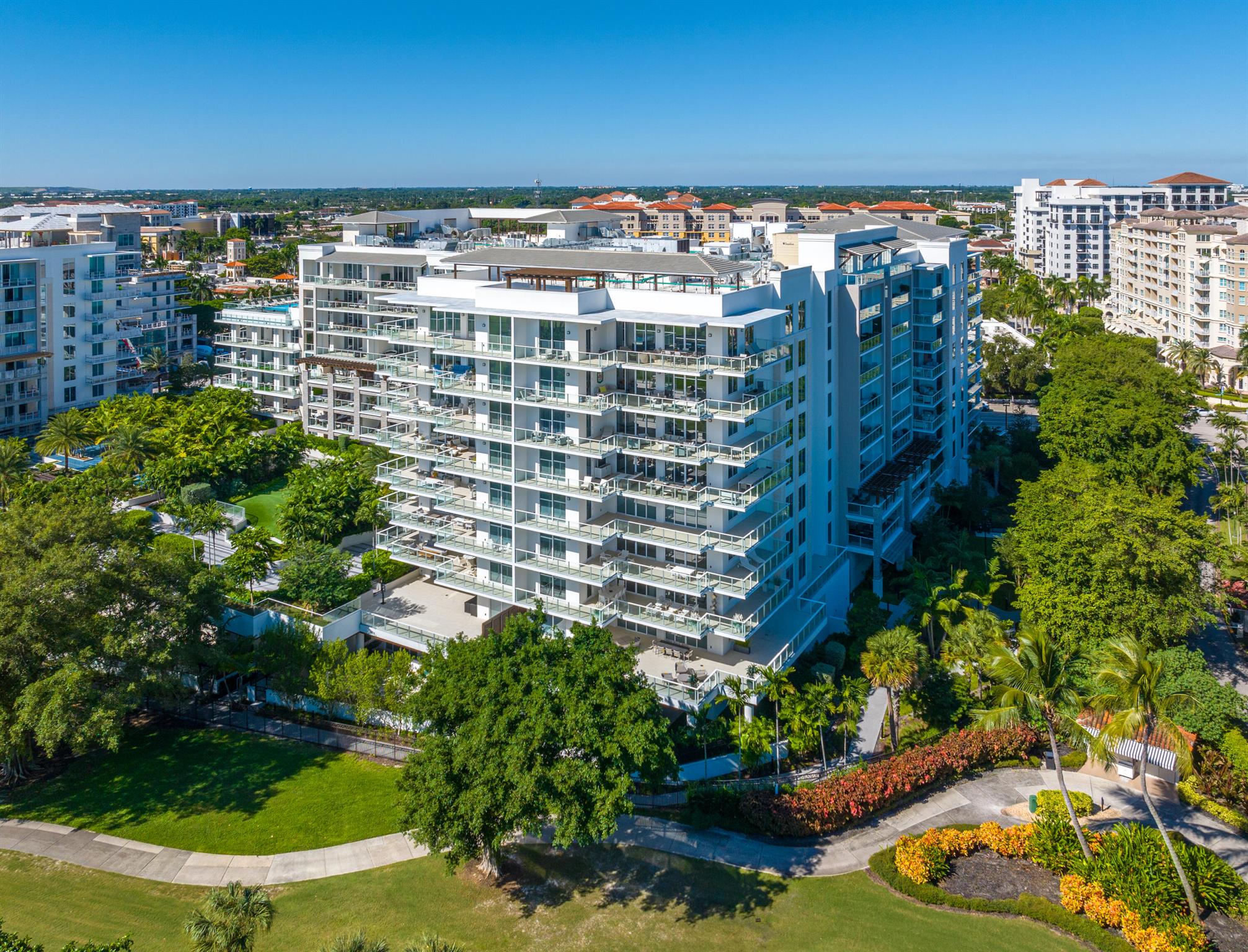 Alina Residences premier NE facing condominium with private elevator foyer and deeded parking spot. Alina Residences was designed by Garcia Stromberg/GS4 Studios and developed by Elad Group. Residence 714 features an open floor plan and contemporary design with 3 bedrooms, 3.1 baths, private elevator and an expansive private balcony overlooking the golf course. One windowless bedroom can be a den/office space with full bath and closet. The interior features include porcelain tile floors, floor to ceiling sliding glass doors, European-style gourmet kitchen with quartz countertops and a cascading kitchen island, Miele appliances, wine cooler, sculptured hood and hidden walk-in pantry. MORE...