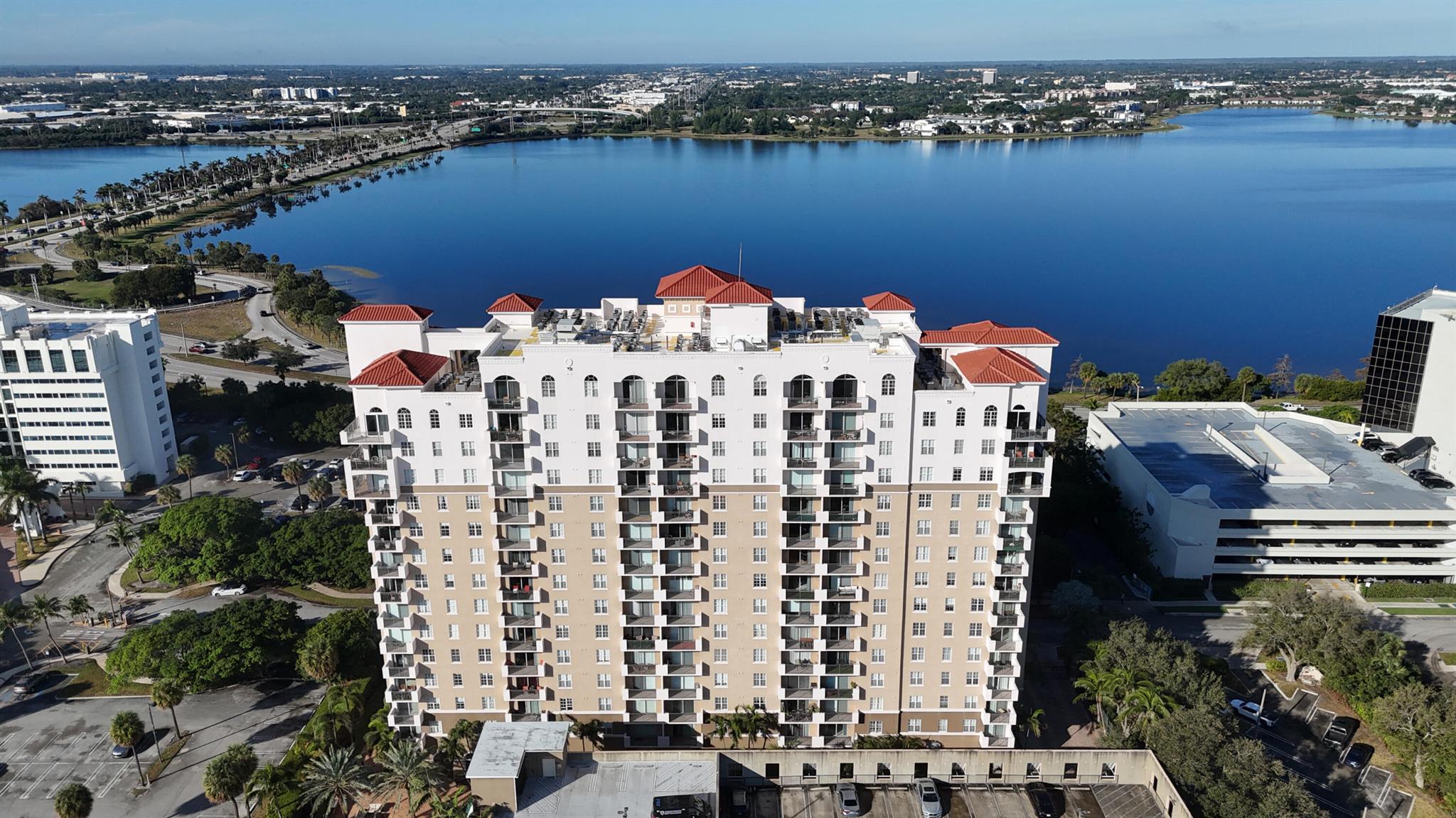 LOWER PRICE JUST ADJUSTED!!!!!!!!Welcome to luxury living in the heart of West Palm Beach. This stunning luxurious corner 2 bedroom, 2 bath condominium on the 7th floor features a split floor plan. Your awesome future home boasts engineered plank flooring throughout. It's located in a perfectly well-maintained full-service property, A private balcony offers breathtaking city sunsets and, perfect for those who love nature and city living. This luxury pet-friendly property has a suite of resort style amenities that includes a beautiful pool, sauna, covered garage parking, EV Charging Stations, a fully equipped fitness center, concierge services, and much more. Located just a few miles from the beach, world famous Worth Avenue, & Palm Beach International Airport.