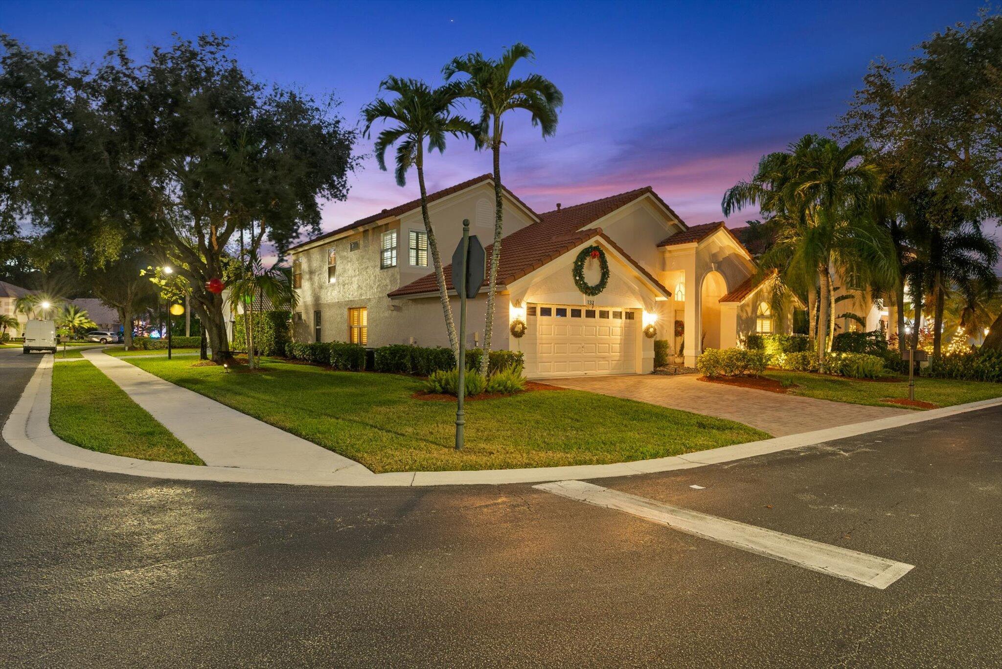 Welcome to your dream home in the prestigious Bent Tree community of Palm Beach Gardens. This beautifully remodeled 4-bedroom, 3-bathroom pool home offers over 2,500 square feet of living space on a spacious corner lot, combining modern updates with a prime location.  This is a perfect family home.   The home's open concept layout features high volume ceilings of 14 ft. in the entry living room, over 20 feet in the family room, and over 10 feet in the master bedroom, all of which provide for amazing natural light throughout home.  Three sets of impact glass French doors lead you to the outdoor pool patio area.  The home has been meticulously updated over the years, featuring new cabinets, lighting, hard wood flooring throughout first floor, fully remodeled bathrooms, exterior gutter and downspouts, paver driveway and walkway, travertine pavers around pool, gas pool heater, impact glass windows, and recently painted interior and exterior.  A new roof was completed in 2022, ensuring durability and peace of mind. The backyard is a true oasis, designed for entertaining with a sparkling pool, multicolored LED pool light, and plenty of space to relax or host gatherings.  The home also features partial lake view and lake access, two car garage, attic space for storage, and an additional open space on the second floor likely for home office, fitness, or play area.  
Bent Tree is a gated neighborhood featuring a community pool, tennis courts, and relatively low HOA quarterly dues.  The location offers unparalleled convenience. You'll enjoy immediate access to I-95, the Turnpike, and the PGA Blvd. corridor which offers some of Palm Beach County's best shopping destinations, Gardens Mall, restaurants, offices, hotels, and more.   For families, the home is within walking distance of top public schools Timber Trace Elementary and Watson B. Duncan Middle School, making the morning routine a breeze.  Some of the areas top private schools are also within a 5 - 10 minute drive.  
Outdoor enthusiasts will appreciate the proximity to PGA National resort, and Gardens North District County Park, which features soccer fields, tennis courts, pickle ball courts, basketball courts, playgrounds, and scenic walking and biking trails. The park is currently undergoing an expansion to add even more amenities. Golfers will love the nearby public and private golf courses, while beach lovers can take advantage of being within ten minutes of the pristine shores of Jupiter, Juno Beach, and Singer Island.
This home also offers quick access to Downtown West Palm Beach and Palm Beach International Airport, both just a 15-minute drive away. Bent Tree's tree-lined streets and tranquil atmosphere make it one of the most desirable communities in Palm Beach Gardens, and this property is a true gem. Schedule your private showing today and experience all that this exceptional home has to offer.