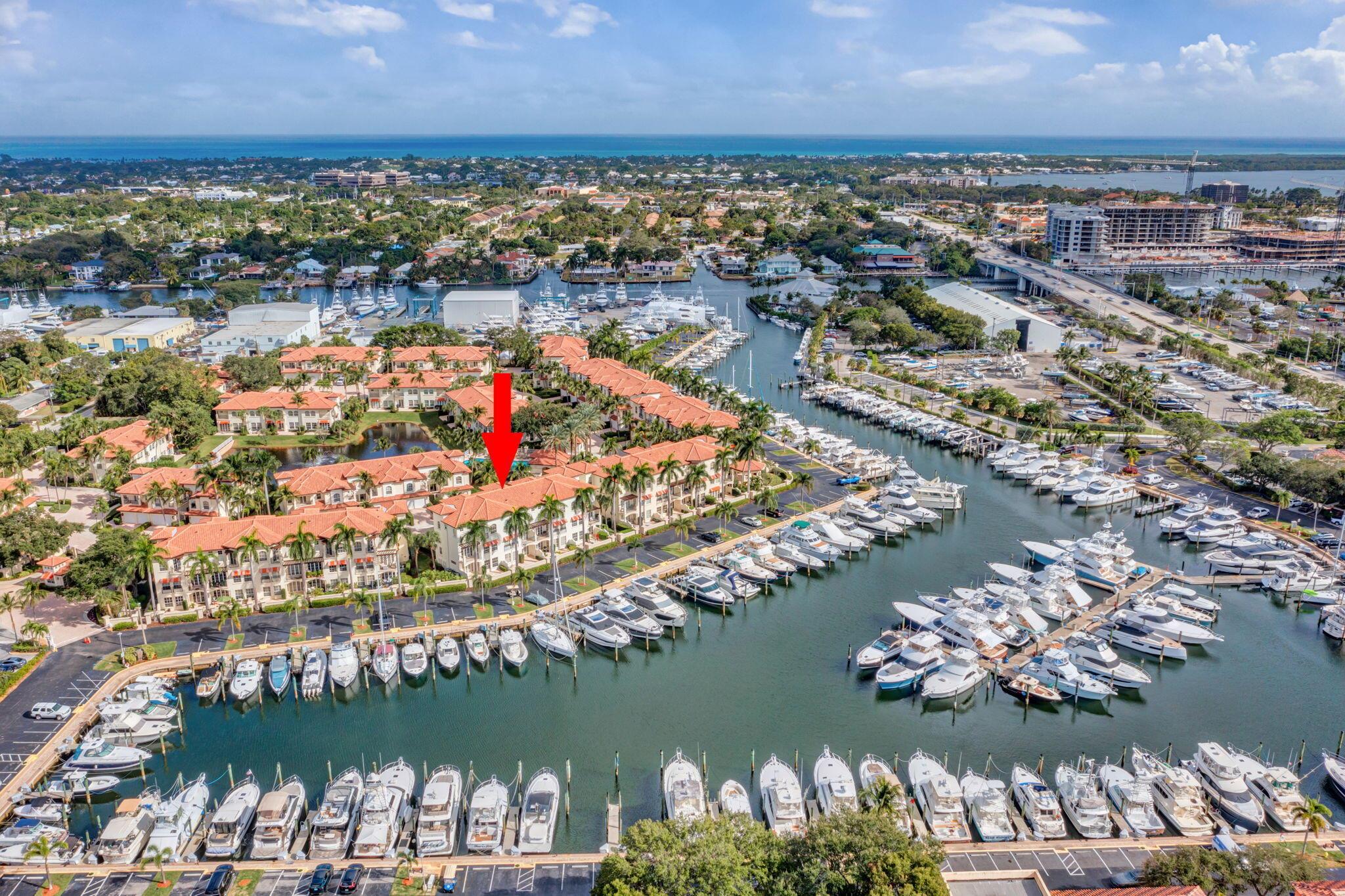 45' Slip Sold Separately w/unit! Indulge in Luxury & Sophistication w/This Fully Furnished Decorator Designed 3-Story Waterfront Townhouse Perfectly Situated in Exclusive Gated Community of Marina Gardens on Soverel Harbour Marina. This Meticulously Remodeled Home Offers 3 BR, 4 BA, 2 Car Garage, Private Elevator & a Versatile 1st Floor Bonus Room Complete w/Oversized Quartz Wet Bar Featuring Under Counter Lighting, Refrigerator, & Full Bath. Elegant Honed Saturnia Marble Floors,Plantation Shutters & Impact Windows & Doors Throughout, While Sleek Panel Glass w/Metal Railings Accentuate Staircase.  Gourmet Kitchen Boasts a 5- Burner Natural Gas Cooktop, Expansive Island, Appliance Garage, Pantry Cabinets w/Pullout Shelves. Wine Rm/Din Rm Features a Stunning Built-In Wine Wall w/Sub-Zero..