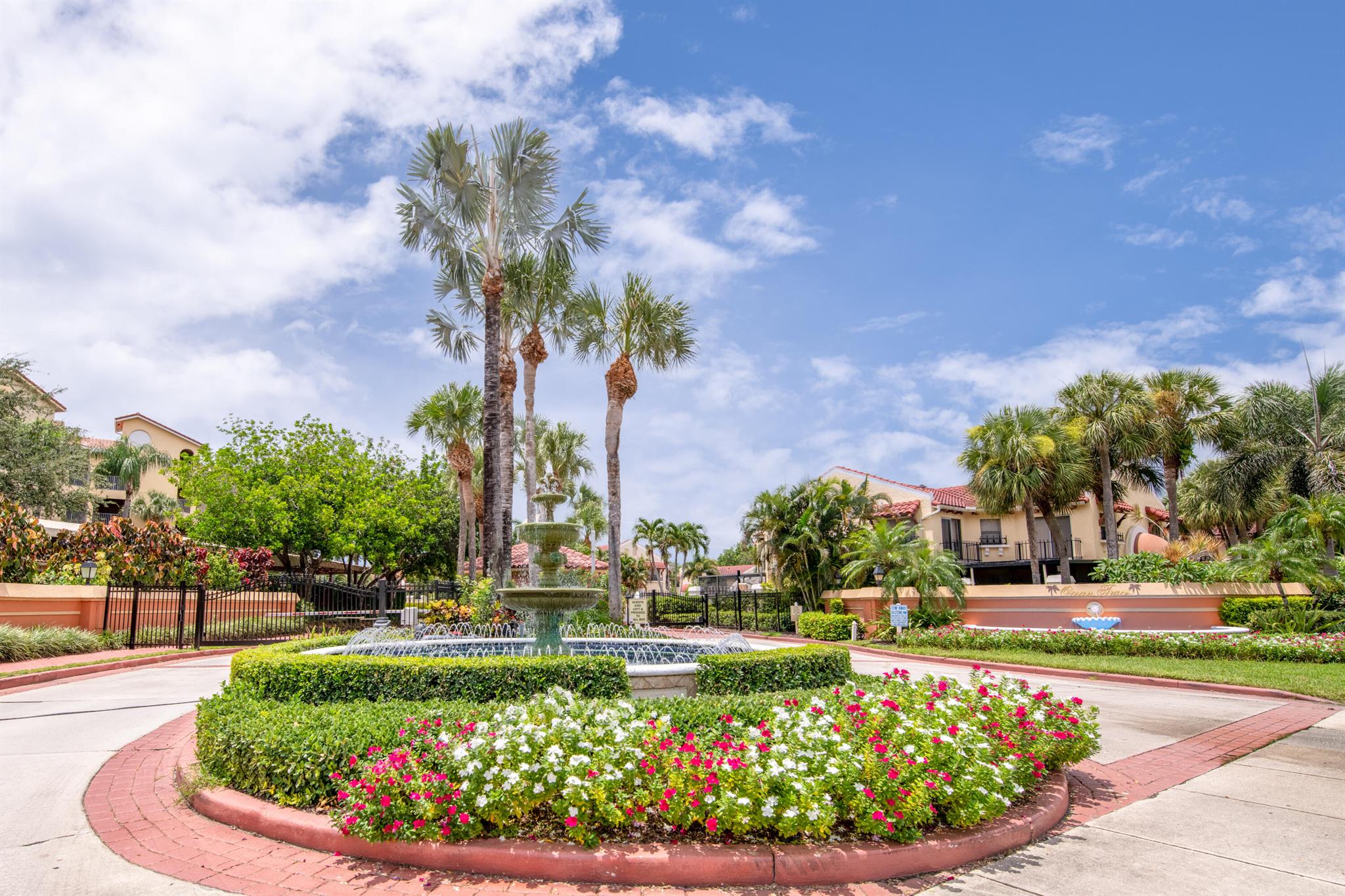 Beautifully renovated and ready to move-in!  Experience the luxury of living in Juno Beach in the popular gated Ocean Trace Community. Upon entry, this spacious 2 bedroom/ 2 bath 2nd floor condo has an open floor plan with stunning lake and pool views. Designer touches throughout- kitchen offers Samsung SS appliances including a french door refrigerator, granite counters, a center island, and wood cabinetry. Bathrooms are tastefully renovated, newer plank tile flooring in the kitchen and laminate flooring in the living areas. No wait to lease after closing! Building has a new roof and the assessment is paid-in-full. Furniture negotiable~option to purchase fully furnished- Turnkey. Ocean Trace is a Mediterranean style condominium community consisting of six, four-story buildings surrounding a lake that is known for its beautifully landscaped 19 acres, fountains, and resort-like amenities.  Enjoy two pools, Jacuzzis, an on-site fitness center, a grill park and a community club house.  Just a short car, bike ride or walk to the beach or the Intracoastal, it is surrounded by local parks, plenty of restaurants, exquisite shopping, and I-95.