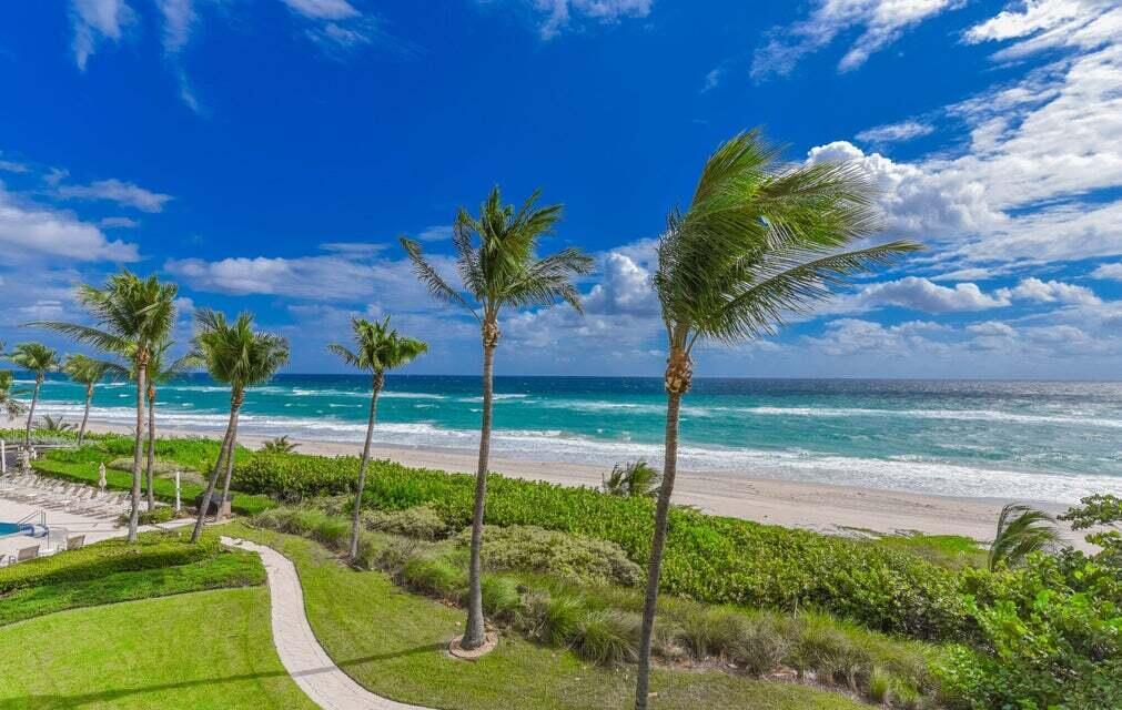 Live on exclusive Hillsboro Mile.  A boutique Condominium located on a private beach.  Nestled between Boca Raton and Ft. Lauderdale, Unit 301 is directly on the ocean.  This 2 bedroom, 2 1/2 bath residence has just been completely painted white and marble floors throughout have been polished.  Two balconies, private elevator, oceanfront 2 story , meeting room with kitchen, valet parking.  24 hr. security.  Resort style heated pool.  Stunning newly renovated lobby to welcome your guests.  Watch the boats go by on the Intracoastal.  If you are seeking an elite and elegant building, Ocean Grande is for you!