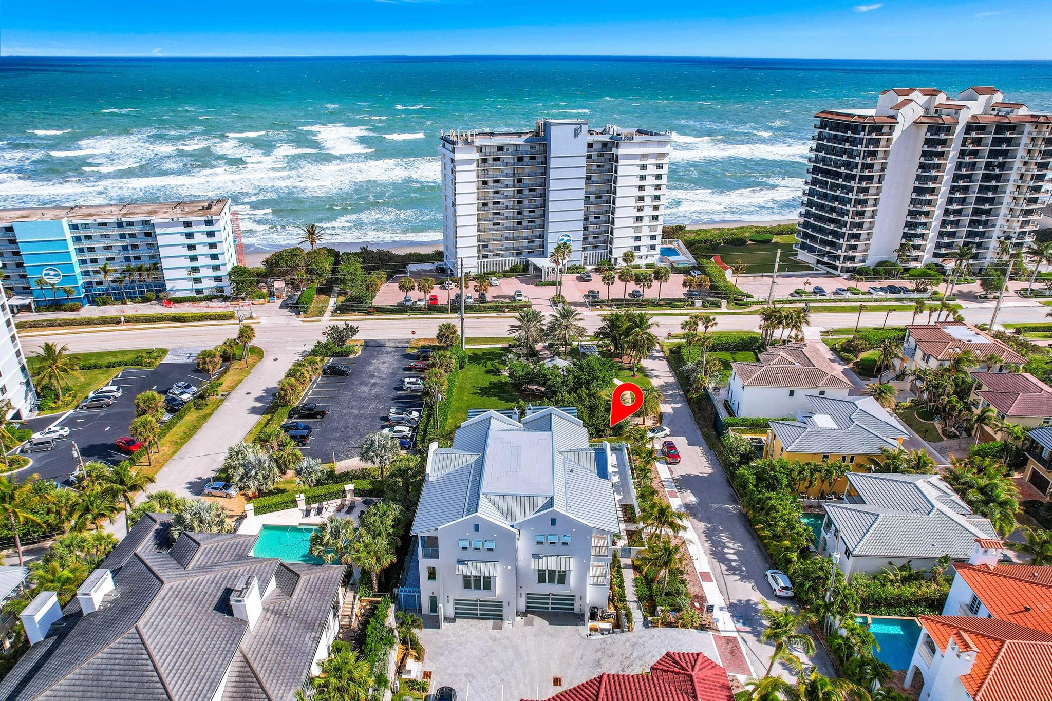 A Coastal Masterpiece!Step into luxury at 461 Venus Drive, a stunning new construction in the heart of Juno Beach, completed in 2024. This three-story coastal retreat offers dramatic ocean views from every level, creating a breathtaking backdrop of blue water for your daily life.Designed for ultimate comfort and convenience, this custom-built property is packed with many luxurious features. Enjoy your own private heated pool and spa, perfect for year-round relaxation. The state-of-the-art Lutron Low Voltage system lets you effortlessly control your AC, motorized shades, garage door, and audio-visual equipment. Adding to the convenience is a custom-finished elevator, making every level of this home easily accessible.make sure to click ''see more'' The gourmet kitchen is a chef's dream, equipped with Sub-Zero and Miele appliances, custom quartzite countertops, and elegant wood cabinetry. Two breakfast bars and two summer kitchens provide ample space for entertaining indoors or out. The home features 48 x 48 porcelain floors, level 4 drywall finishes, and custom closet systems throughout, exuding elegance at every turn.

With four expansive balconies, you'll enjoy ocean views from nearly every corner of this residence. Additional highlights include electric toilets, three Lennox AC units with linear diffusers, tankless water heaters and a whole-home Generac generator.

Location is everything! With beach access directly across the street, you'll have your toes in the sand in seconds. Stroll to local favorites like The Kee Grill, Hurricane Cafe, Juno Fish House, and Juno Beach Cafe, or explore the area's premier golf courses and luxurious amenities. Just 30 minutes from Palm Beach International Airport and the Island of Palm Beach, this home offers convenience and coastal charm.

This move-in-ready masterpiece won't last long. Your coastal new construction dream home awaits at 461 Venus Street!