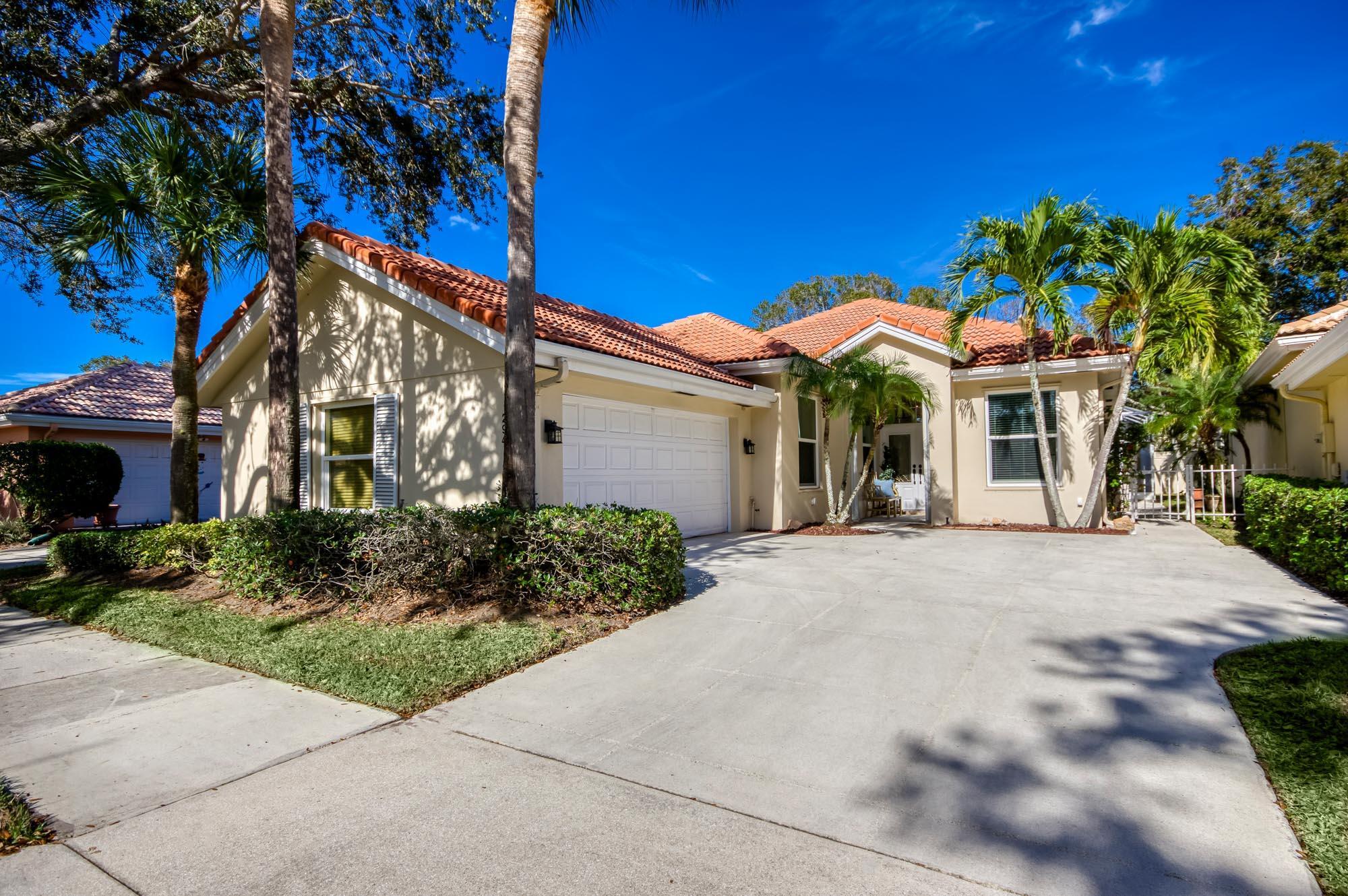 Enjoy the Florida lifestyle in this lovely one-story home in Hamptons at Maplewood, a sought after tree-lined community in the heart of Jupiter. This open concept pool home boasts nearly 2,000 sf and has 3 bedrooms, 2 baths and a 2 car garage. Solid CBS construction and mostly all impact glass. The great room has been updated to a more open floor plan. Tile and luxury vinyl plank flooring flow throughout the home (no carpet here!). Whip up delicious meals in the kitchen featuring granite countertops, wine storage, a tile backsplash and counter bar seating. Rest peacefully in the spacious primary bedroom with dual closets and an expansive bath featuring a floating vanity with dual sinks, a large soaking tub and a walk-in shower. Your guests will be comfortable in the 2 guest bedrooms updated with luxury vinyl plank &amp; crown molding. The guest bath features an upgraded vanity and gorgeous chandelier. Relish the beautiful Florida weather and privacy from the fully screen-enclosed outdoor living area with an expansive pool. Hamptons at Maplewood is zoned for top rated schools and is conveniently located within close proximity of I-95 and the FL Turnpike, beaches, shopping, restaurants, parks &amp; nature preserves. Welcome home!