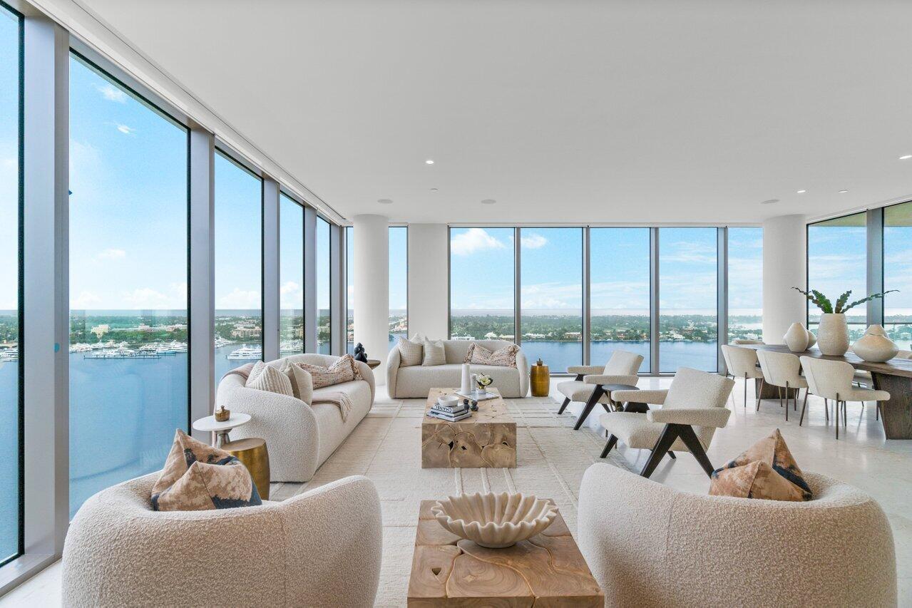 Available April 1, Beautifully and fully furnished by Arhaus, this high floor 3BR  boasts breathtaking panoramic views of the City, the Intracoastal, Palm Beach Island and the Ocean. Top of the line upgrades throughout. TVs in every BR plus LR. Two garage spaces, one having an EV charger, included. Annual leases only.