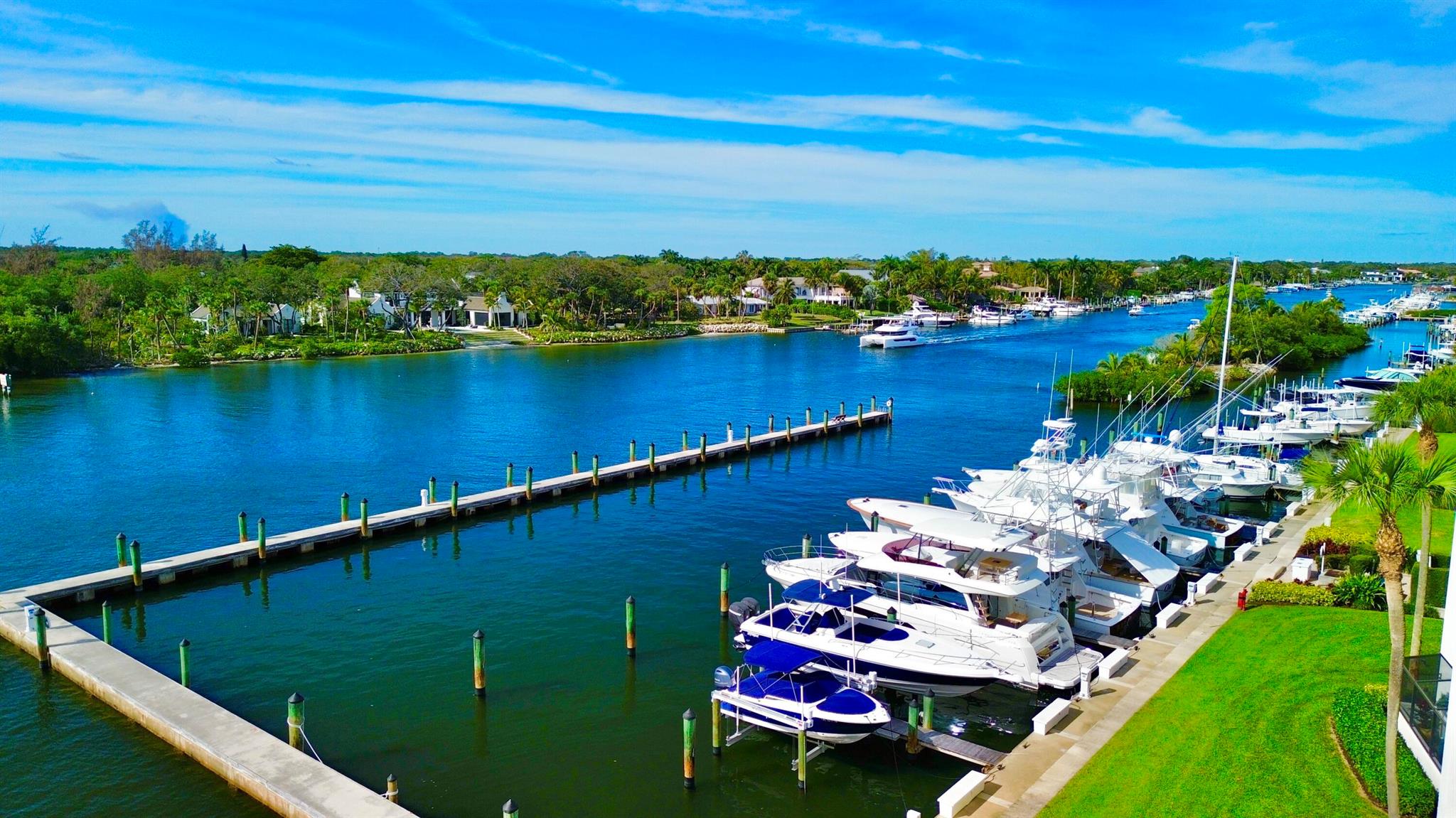 Hidden gem! Unique and private 3 bedroom 2.5 bath corner unit with over 1,600 SF of living space featuring direct intracoastal and sunset views in the gated community of Oak Harbour. Hurricane impact windows! Sophisticated high end finishes throughout such as marble in the kitchen and Herringbone Wood floors in the living areas, both made by Paris Ceramics. French Limestone on the balcony. Bosche and GE Monogram appliances, tankless water heater, Francois & Co backsplash. Expansive covered and screened balcony. Manned security gate. Prime Juno Beach location close to the ocean, shopping, and dining. A one of a kind!