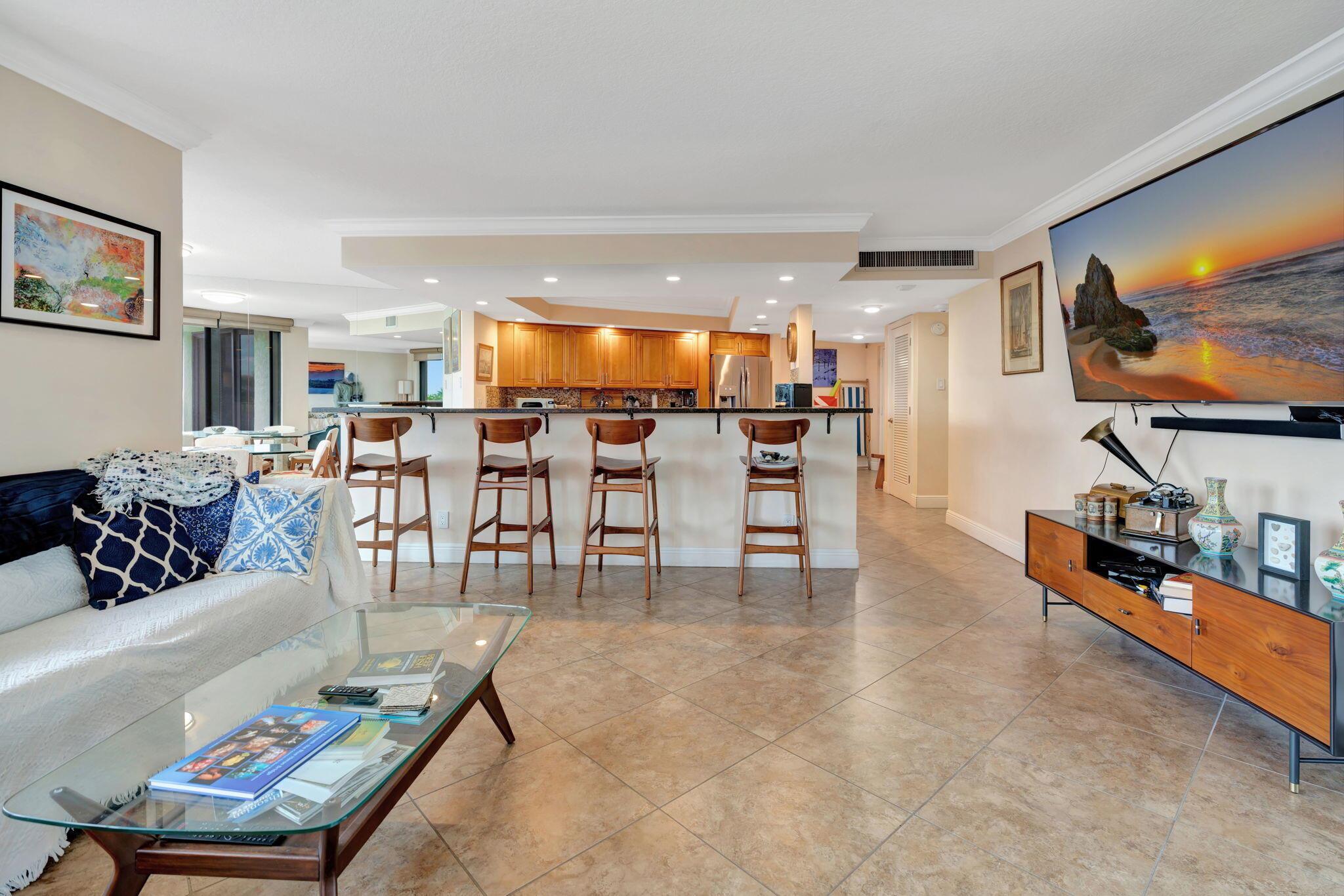 Recently updated unit on the northern (skinny) part of Singer Island. Tile and wood flooring throughout. Opened up kitchen to the living and dining area. High speed internet and cable included. Connemara has a large social room, heated pool, tennis court w/pickle ball and an outdoor grilling area. Close to fantastic shopping, dining, and entertainment. Less than 30 minutes to Palm Beach International airport. Come and check out your new home. It's close to mine. We have lived in Connemara for over 22 years and can't believe we have found the perfect place to retire. I hope many more folks find what we have here. It's ideal and we love it. Each year there are less and less condos available for less than $1,000,000 that are directly on the ocean, and we are very happy to have found one.