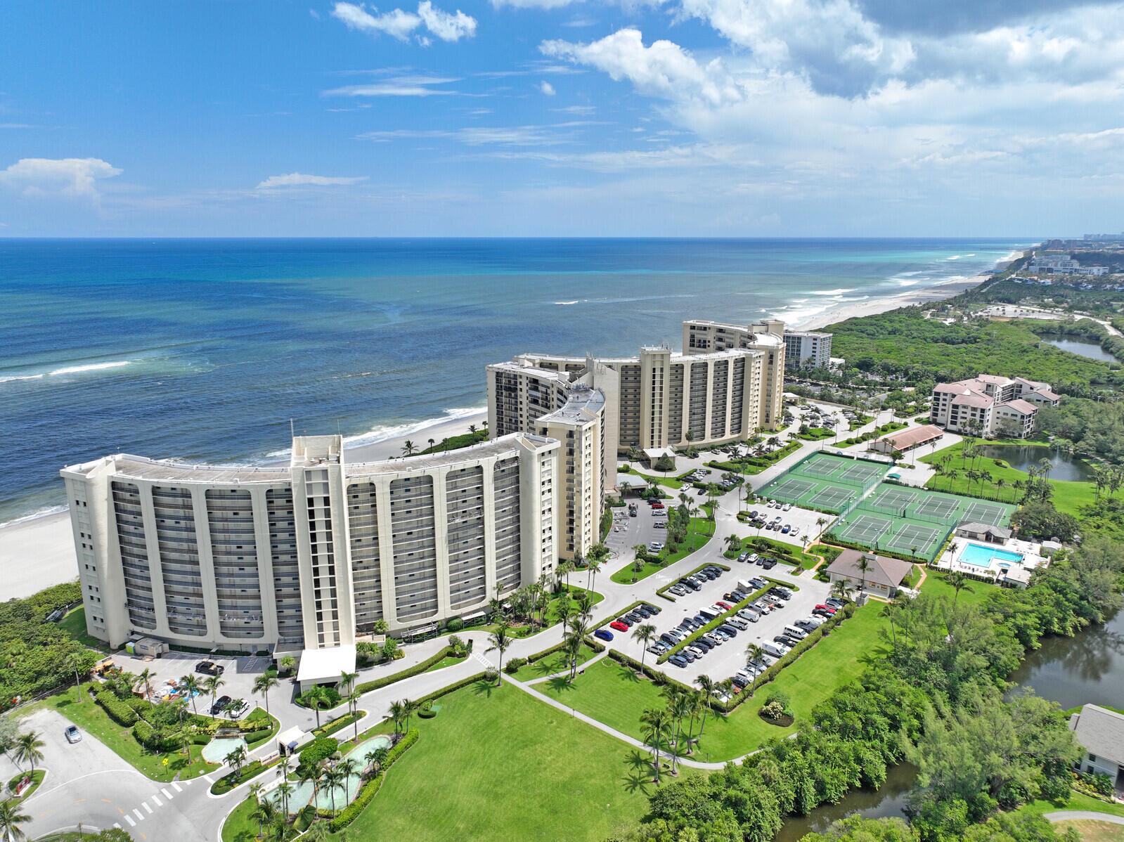 This is it!  Your search has come to an end.  This home offers an amazing beachfront experience with the enchantment of the Atlantic Ocean.  Jupiter Beach is a location that can change your life forever.  This two bedroom two bath Ocean front condominium offers a one-of-a-kind style of living at the BEACH in Jupiter, Florida - at the best VALUE.  The direct views of the Atlantic Ocean offer a magnificent setting for a cup of coffee on the balcony at Sunrise and a nice glass of vino at Sunset.  Watch the turtles crawl the beach while taking in the Ocean breeze, breaking waves, swaying palm trees and overall amazing views.  It's luxury living on the beach in Jupiter.  This location is right in the middle of everything fun about Jupiter and the Inlet District.  This is a MUST see!