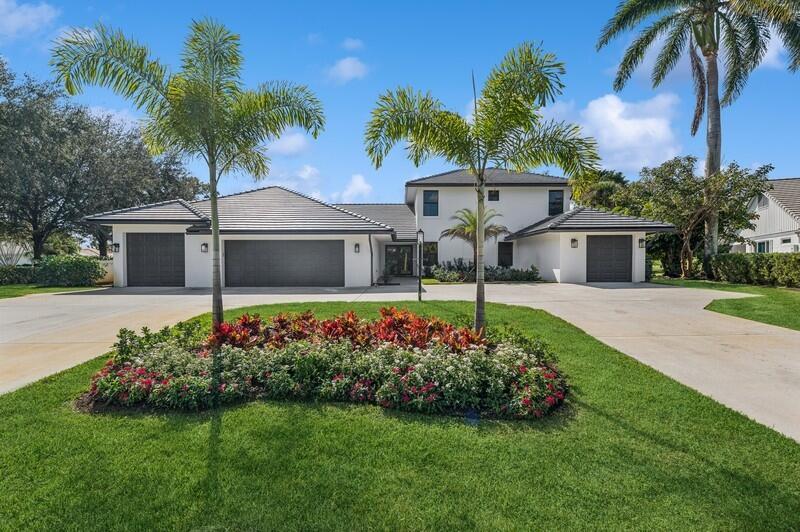 Welcome to your exquisite home in the exceptional Delray Dunes Golf & Country Club. This fully renovated and redesigned masterpiece blends modern luxury with timeless elegance, offering 5 bedrooms, 3 full baths, and 1 half baths within 4,700 square feet of thoughtfully designed living space. The heart of the home is the chef's kitchen, featuring a Sub-Zero refrigerator, Wolf gas stove, appliance garage, and a large center island--perfect for cooking and entertaining. The owner's suite provides a private retreat with a spacious bedroom, spa-like bathroom, and a custom-built closet. Additional highlights include a custom bar and a state-of-the-art movie theater with a 96-inch TV, surround sound, and theater seating for a true cinematic experience. Three bedrooms are located upstairs bedrooms are complemented by a loft and a large patio deck with stunning views of the 12th hole. Outside, the expansive screened pool area features a BBQ station and covered porch, perfect for enjoying the serene Florida lifestyle. The property also offers a 3-car garage, a golf cart garage, and a circular driveway for convenience. Modern amenities include 4 new Trane AC units, impact-resistant windows and doors, custom pre-engineered wood floors, and Wi-Fi 6 access points for seamless connectivity. Two laundry rooms add further convenience for daily living.
Located in a mandatory membership community, Delray Dunes offers an exceptional lifestyle with exclusive amenities, including a newly renovated 18-hole Pete Dye golf course designed for players of all skill levels. Don't miss the opportunity to own this extraordinary home.