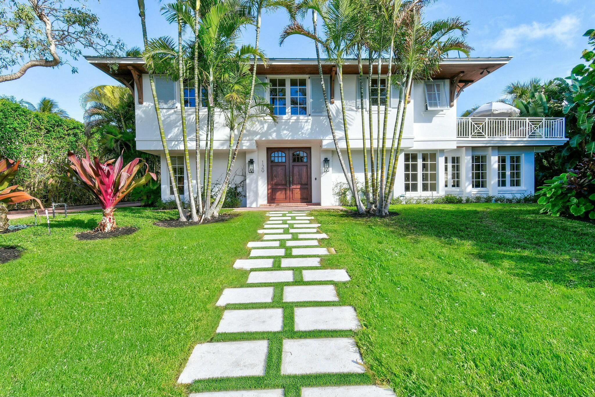 Welcome to 129 Lighthouse Drive, your coastal oasis nestled in the coveted beachside community of Jupiter Inlet Colony. This stunning residence offers 6 bedrooms, 6 bathrooms, and an expansive 4,223 sq. ft. of meticulously designed living space. Upon entering, you'll be captivated by the abundance of natural light and exquisite architectural details that grace every corner of this home. The chef's kitchen boasts top-of-the-line appliances, a gas stove, custom cabinetry, and a charming breakfast nook that flows effortlessly into the formal dining area. The second floor is home to a spacious master suite, complete with a private balcony offering partial views of the picturesque Intracoastal. Also on this level are an oversized bonus room, perfect as a playroom or additional family space, a cozy reading nook, and a large laundry room for added convenience.  Step outside to your private outdoor retreat, where a heated pool, spa, cabana bath, and covered patio are set amidst lush tropical landscaping. This serene space is perfect for relaxation or entertaining. Recent updates include all impact windows and doors, new electrical systems, HVAC, and ductwork. A propane pool heater was installed in 2021, ensuring year-round enjoyment. Ideally located, this property offers easy access to Jupiter's pristine beaches, marinas, and world-class golf courses. The exclusive Jupiter Inlet Colony community provides 24/7 security for your peace of mind. Don't miss the chance to call this exceptional property your own and experience the ultimate in coastal luxury living.