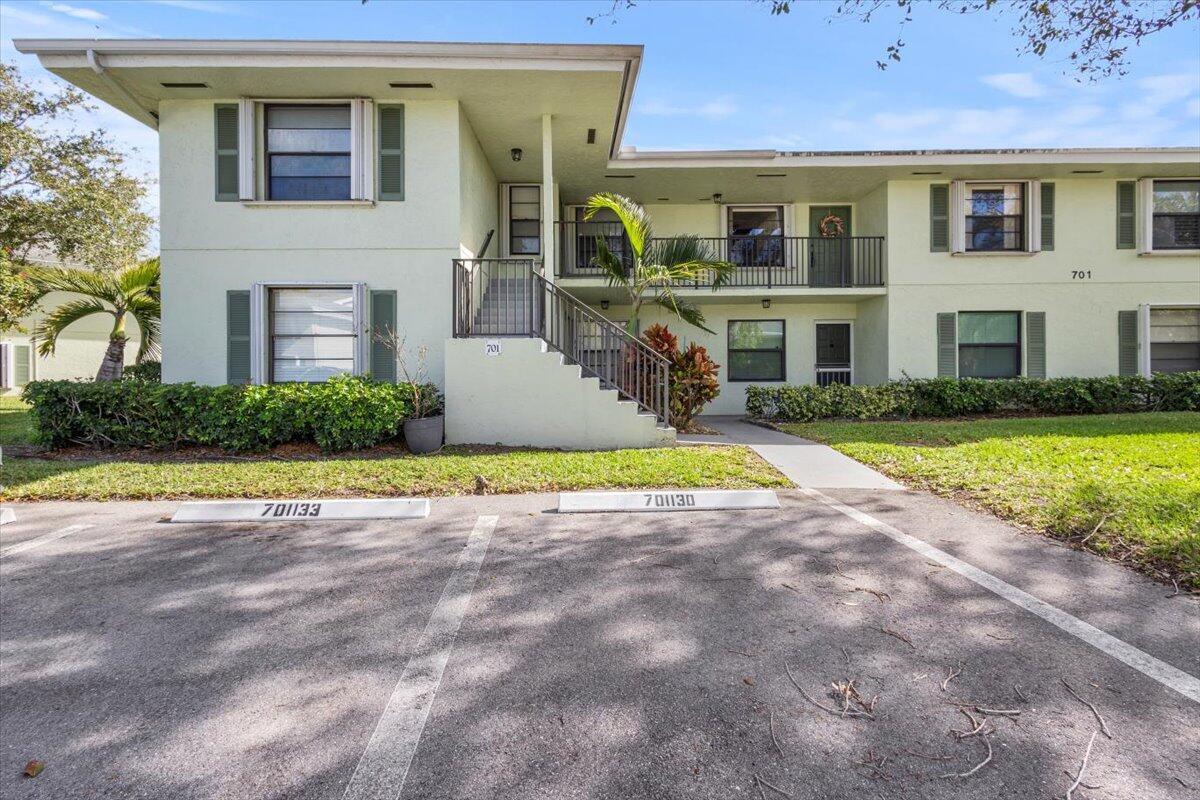 This is a stunning second story unit with a screen enclosed balcony overlooking a community lake and fountain Western exposure so the balcony enjoys the cool shade from about 10:00 am on.  Full accordion shutters allow you to securely enjoy this luxurious unit redone with modern contemporary finishes, the best views in the community, and unbeatable proximity to all things Palm Beach Gardens and South Florida have to offer.  Mere minutes to I-95, Gardens Mall, Abacoa, Alton, and the most beautiful beaches in the world.  Your peace in paradise awaits.