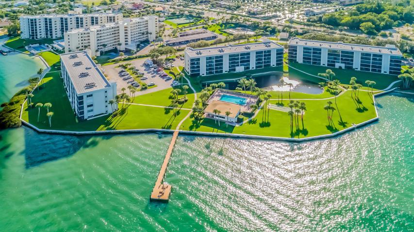 PRICED TO SELL for a Renovation to your taste. A spectacular third floor unit with views of the open Intracoastal and Jupiter Island. Glass enclosed balcony for extra living space. This vibrant 55 and over community is walking distance to 9 restaurants and Publix. A MUST SEE!!