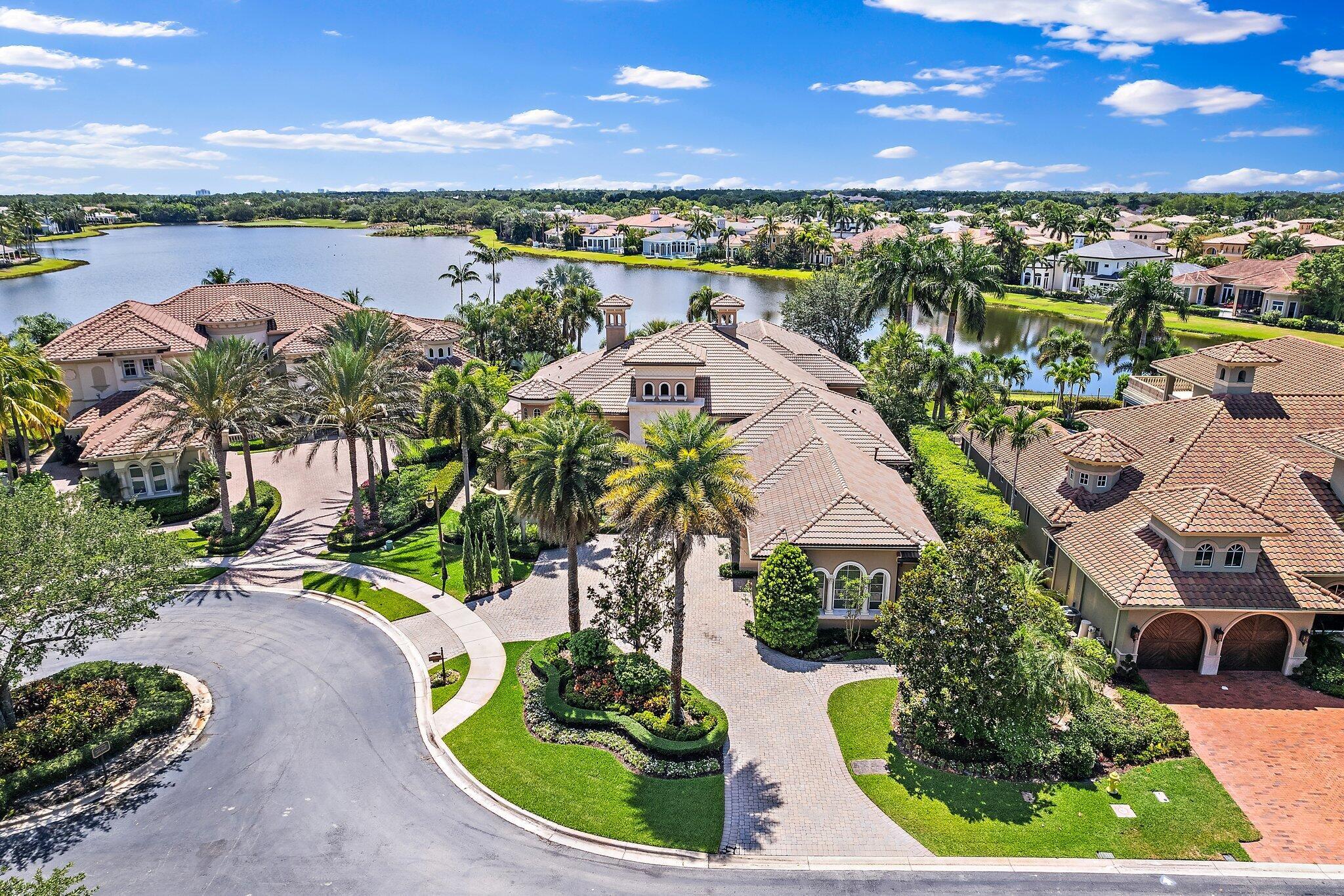 Best view in Mirasol!!!! Sunny, SE exposure with the longest lake view in Mirasol and located on a large & private, half acre cul-de-sac lot with circular driveway, this custom one level estate home offers magnificent water views, four bedrooms, six full baths, two 1/2 baths, an office & a theater with new TV and large screened patio. Naturally lit, neutral colors & open floor plan. Grand foyer with breathtaking views of the lake, marble floors, beautiful ceiling detail & crown moldings throughout. Kitchen offers top of the line appliances, center island w/sink, 2 dishwashers, Thermador 6-burner gas stove/oven, additional double oven, professional Sub-Zero refrigerator/freezer & built in desk. Wake up in the large master Suite w/sitting area and enjoy stunning water the views, his/her baths and closets &amp; a coffee bar. 3 additional suites each featuring private bath. Spectacular outdoor living area boasts expansive water views, infinity pool, spa, screened patio &amp; summer kitchen. Additional features include impact glass throughout and 4.5 car garage. Golf membership available.

Professional photos coming soon.