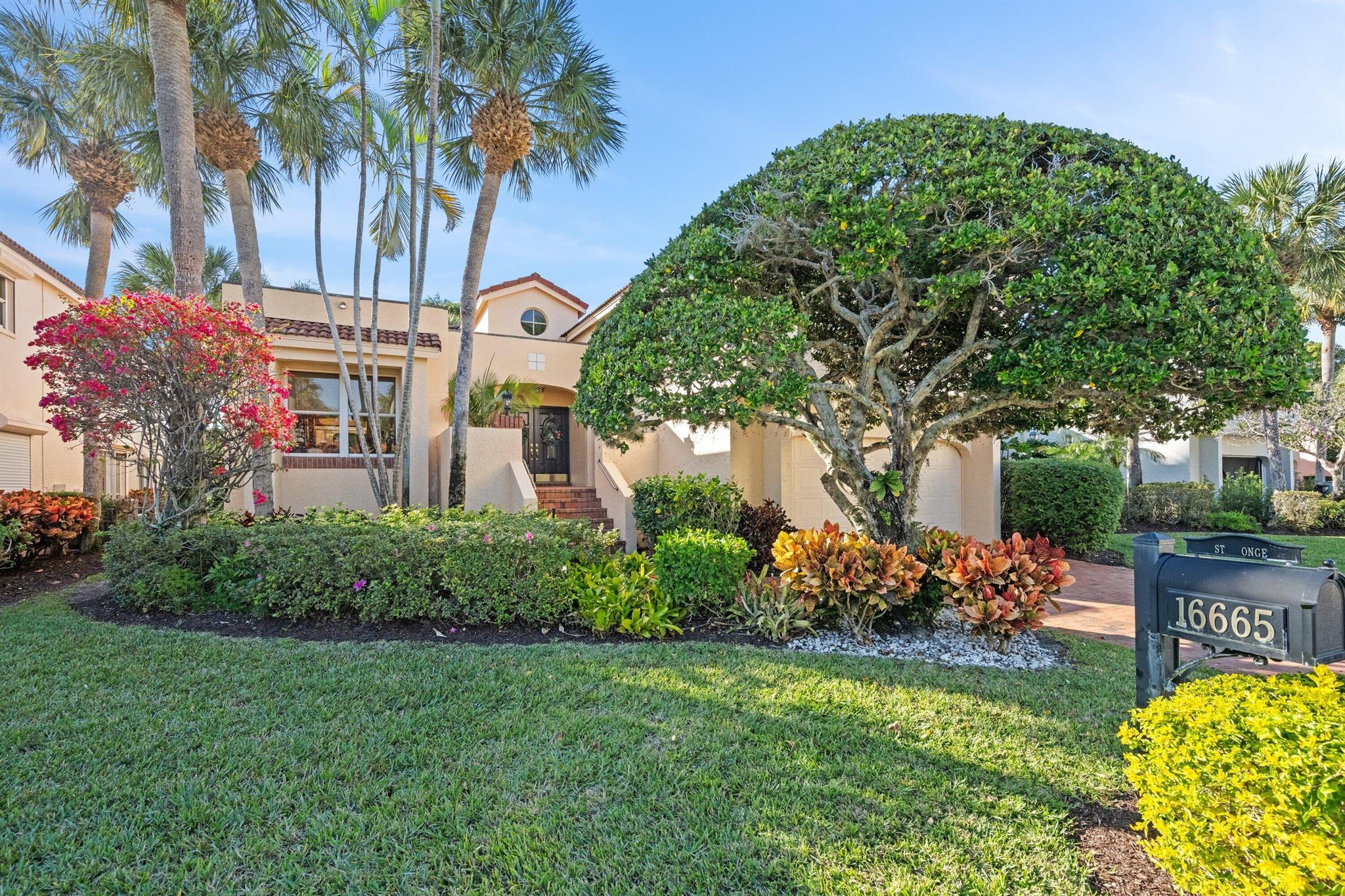 Welcome to 16665 Narrows Dr, a residence nestled within the Narrows subdivision of Jonathan's Landing Golf Club in Jupiter, FL. This elegant home offers three ensuite bedrooms, each thoughtfully designed for comfort and privacy. The grand double-height living and dining area sets the tone with its soaring ceilings, abundant natural light, and electric fireplace that creates an inviting ambiance.The home features oak flooring on the main level and bamboo upstairs, blending timeless charm with contemporary style. The enclosed and air-conditioned patio provides an exceptional space for year-round relaxation or entertaining. Recent updates enhance the home's functionality and appeal, including a beautifully redone master bath, a refreshed laundry room, and the addition of two tankless water heaters.
Additional highlights include an epoxy-coated garage floor for a polished and durable finish, as well as a tranquil atrium that invites natural light. Located in Jonathan's Landing, this home offers an unparalleled lifestyle with access to world-class golf, tennis, a private marina, and proximity to Jupiter's stunning beaches and vibrant dining options. This exceptional property seamlessly combines luxury, comfort, and modern convenience, making it the perfect place to call home.