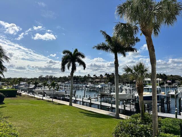 Stop your search - YOU FOUND IT!  This 3 bed 2 bath totally renovated condo at Bay Colony has amazing direct Intracoastal and Marina views!  You will love the Sunset from either your balcony or dock.  That's right this deal included a boat slip with a new 20,000 pound lift (Slip #19 fits up to a 40 foot boat).  You can see your boat directly from the living room, primary bedroom, or the fully enclosed balcony (impact glass), which adds additional living space to this luxury home. You can access the balcony from both the living room and primary.  The kitchen features white and blue soft-close cabinets, gold-colored pulls, quartz countertops, large stainless sink, gold-colored faucet with pull down spray, stainless appliances, and office nook. The views from the kitchen of the Intracoastal are breathtaking.  The dinning / living area features a large wet bar with wine and drink refrigerators and counter/cabinets that match the kitchen.  The primary bedroom has a large on-suite bathroom with oversized shower and walk-in closet.  Bay Colony sits on nearly 14 acres tropical landscape and represents resort-style living with tangible amenities.  This location is everything fun about Palm Beach County.