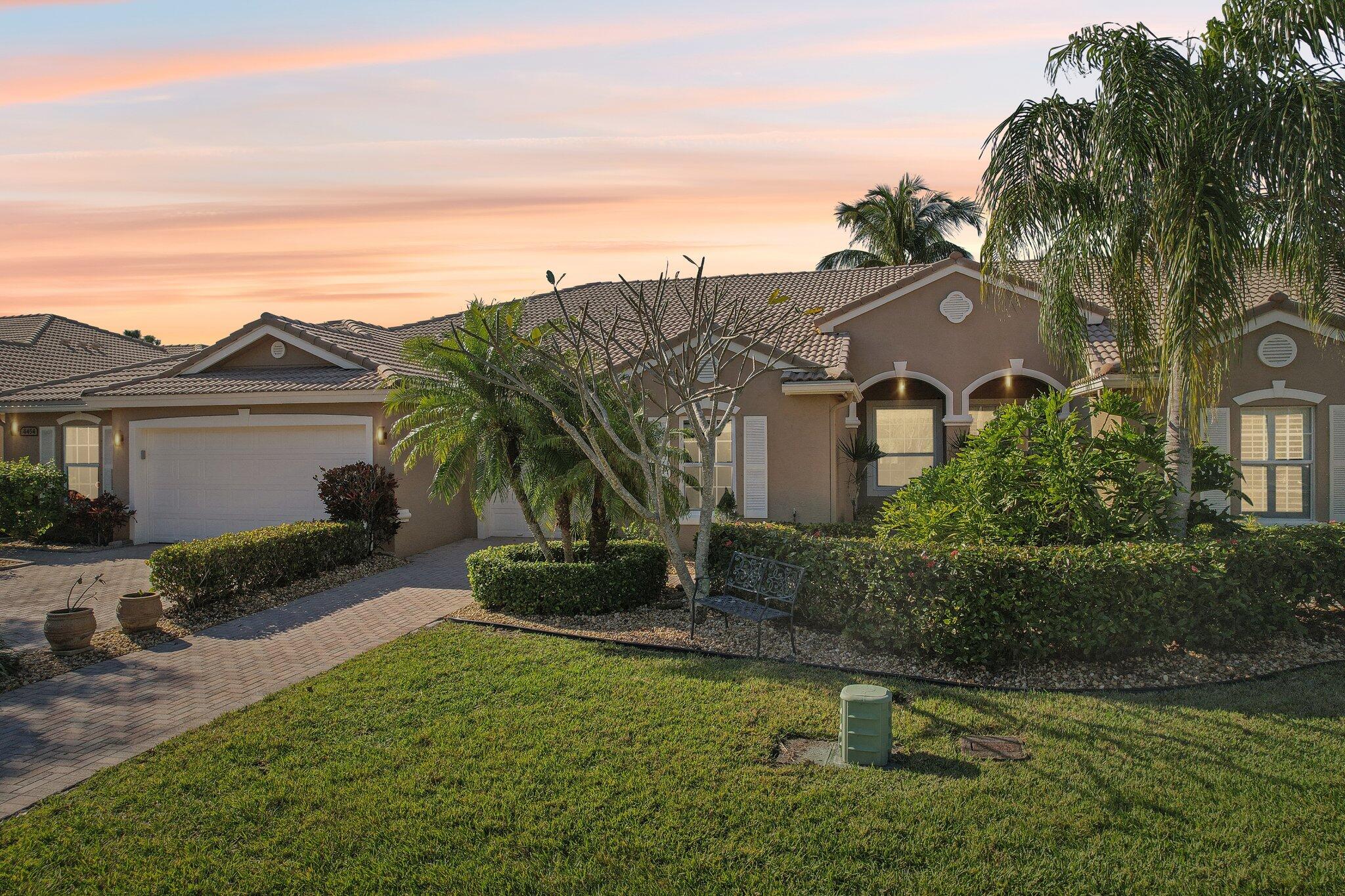 Welcome Home to this updated 2-bedroom, 2-bath villa in the Jensen Beach Country Club! The modern kitchen features granite countertops, stainless steel appliances, and new cabinetry. Diagonal tile flooring flows through the main areas, while the bedrooms offer cozy laminate flooring. This home is equipped with IMPACT WINDOWS throughout, ensuring safety and energy efficiency. The spacious primary suite includes walk-in closets, and the home's upgraded light fixtures add a contemporary touch. Relax on the screened-in lanai, perfect for enjoying the Florida weather. Updates include a 2020 AC, 2014 hot water heater, and 2010 microwave for peace of mind. Enjoy golf, tennis, and the community pool, all just minutes from beaches, shopping, and dining. Don't miss this chance to live in paradise!