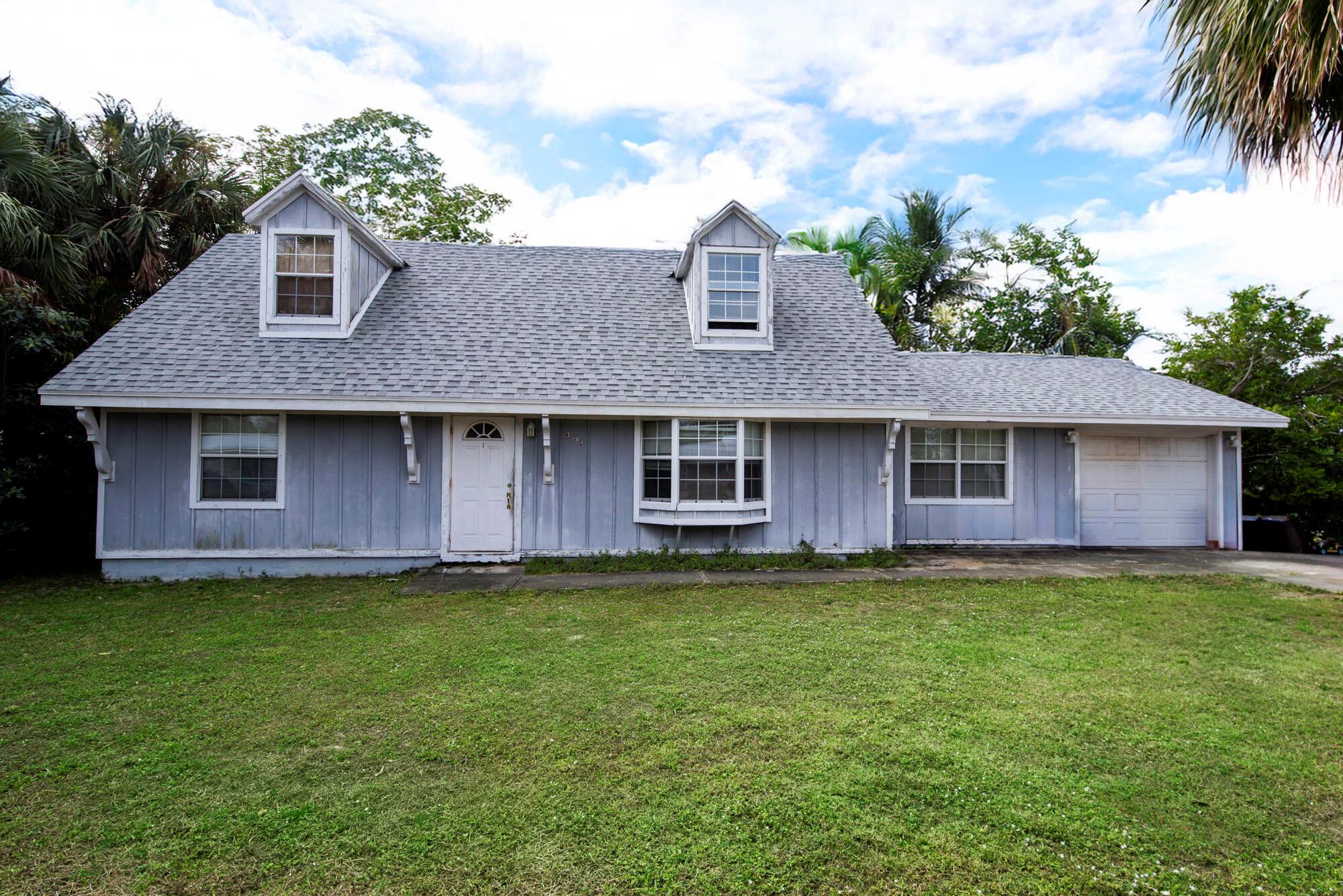 Nestled just minutes from Hutchinson Island and walking distance to vibrant downtown Jensen Beach, this spacious 1977 sq ft, 2-story  Cape Cod style home presents an opportunity for renovation and investment. This home features 3-bedrooms with a den/flex space and 2-bathrroms and offers a versatile layout with plenty of potential to transform this great location, into your dream home retreat or a profitable flip. No HOA, so Air BNB or VRBO is ALLOWED! Boat/RV Parking is ALLOWED! Roof has been replaced in 2022, already offering a solid foundation for a profitable project. Schedule your private showing today!