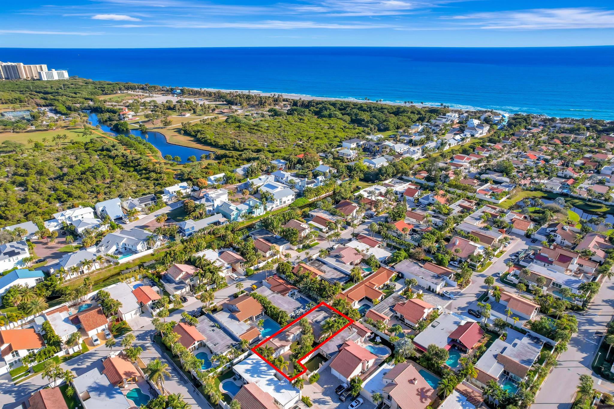 Beautiful, gated community across from the Beach.Private oasis with your own electric gate to your private compound.Beautiful wood floors, and updated Baths and Kitchen. Impact windows, sliders and doors with the exception of 3 windows which have panels.2 Main bedrooms with attached baths with a powder room and spacious office or den.Walk to restaurants, River Walk, the Beach and shopping.Let this beautiful Jupiter home become your dream home.