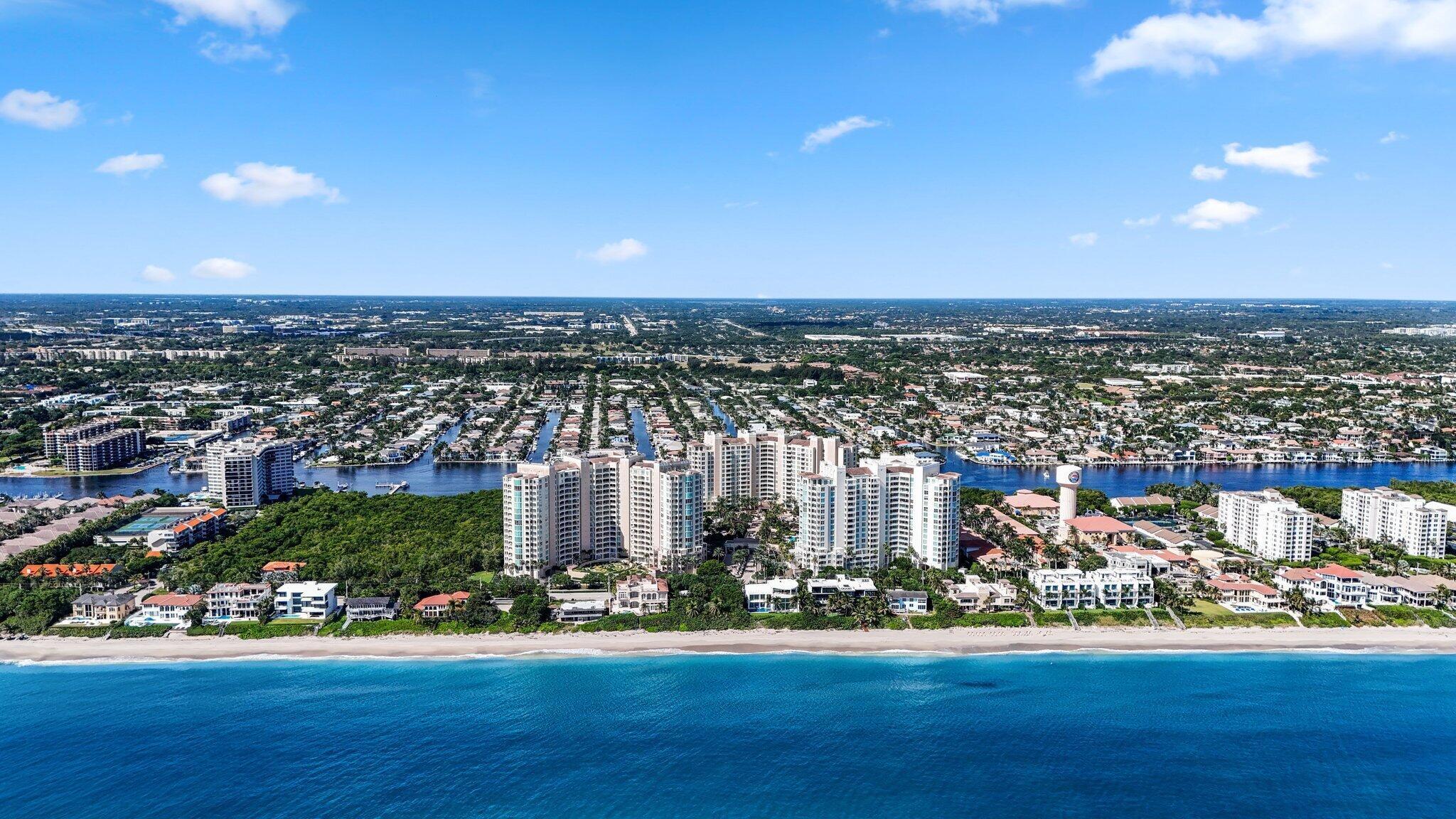 Step out of the elevator into your private lobby of this rarely available high-floor luxurious beach- and Intracoastal-facing condo, located in the renovated North Tower of prestigious Toscana. In this exquisite ''Trevi'' unit, enjoy two large balconies directly overlooking the Intracoastal Waterway and the Atlantic Ocean.  The unit has undergone a complete remodel - - new porcelain tile flooring extends throughout, including in the waterproof balconies and lobby area. This spacious unit was opened with the removal of the wall separating the dining area from the kitchen. The chef's kitchen features a waterfall peninsula, bar seating, and a coffee/sitting area for kitchen-side conversation. Notable features include a second bedroom entrance accessed through a concealed bookcase door off.... the dining area, French doors and direct ocean views in the third bedroom, remote-controlled electric blinds on windows and doors, and sleek smooth ceilings. Additionally, a new leak detection system with automatic and remote shut-off provides peace of mind while you are away. This unit includes two parking spaces, a rare find! (A full list of unit upgrades is available upon request.)  

Toscana epitomizes resort-style living and is ideally situated between Boca Raton and Delray Beach, close to 4 airports and the Brightline train. Residents benefit from access to three luxurious pools and a private beach club, each offering water and towel service, along with tennis courts. The main entrance to the community is gated with 24/7 security, complemented by a valet service at the front of each building, and a 24/7 front desk concierge. The North Tower features a vibrant first floor filled with activities, including a game room, media room, card room, business center, library, and an exceptional fitness center sauna and shower for men and women - all supported by a welcoming concierge!