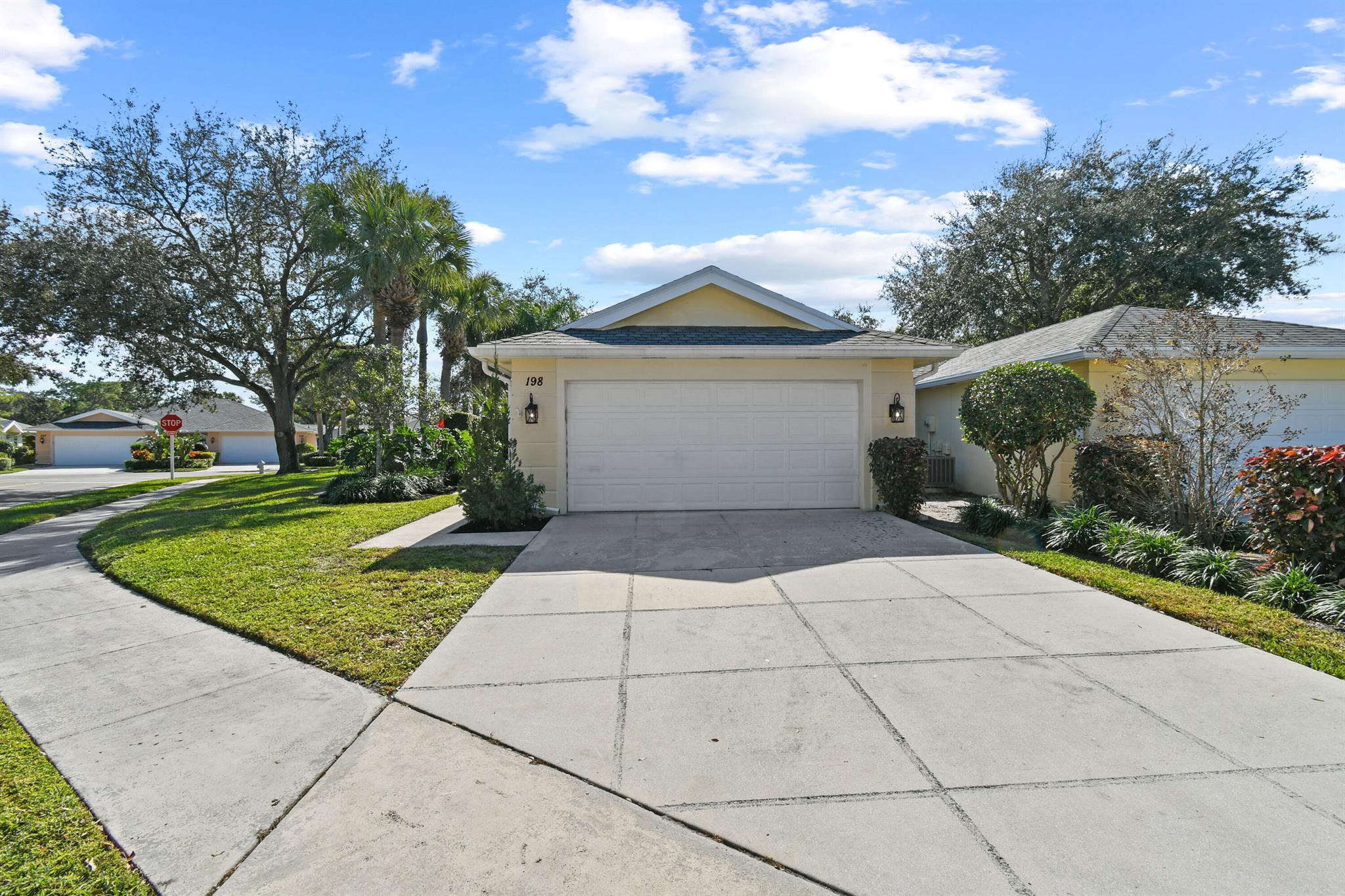 This is the one you've been waiting for! Well-maintained CBS block 2-bed, 2-bath home on a rare corner lot in the highly sought-after Jupiter community, Green Briar Circle. Enjoy a private retreat with a walled backyard, lush tropical landscaping, and screened-in pool with patio. The bright, open floor plan features a generous master suite with walk-in closet & en-suite bath, plus a cozy guest bedroom. With a 2-car garage, laundry room, and low HOA fees, this home is move-in ready or perfect to make your own. Just minutes from golf, tennis, shopping, dining, and Jupiter's beaches. Ideal for year-round living or a seasonal getaway!