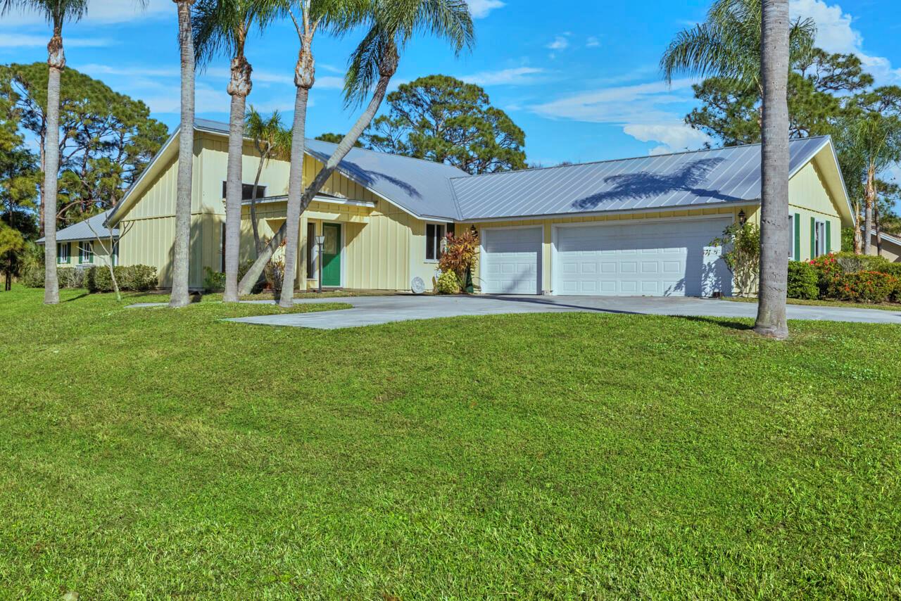 Welcome to 4101 SW Bimini Circle North, Palm City, FL. Nestled within the prestigious Evergreen Club, this stunning pool home has 5-bedroom, 4-bathroom estate offers a touch of luxury in the heart of Palm City. With 3,452 square feet of living space on a lush 0.99-acre lot, the home is a perfect blend of elegance and comfort. It features a 3-car garage, cathedral ceilings, a cozy fireplace. The Evergreen Club community offers a serene atmosphere with a golf course, making it ideal for those who appreciate tranquility and convenience. Plus, it's just a short drive from top-rated schools, shopping, dining, and major highways. Whether you're looking for a family home or a peaceful retreat, this property has it all. If you have any questions or need more information, feel free to ask!