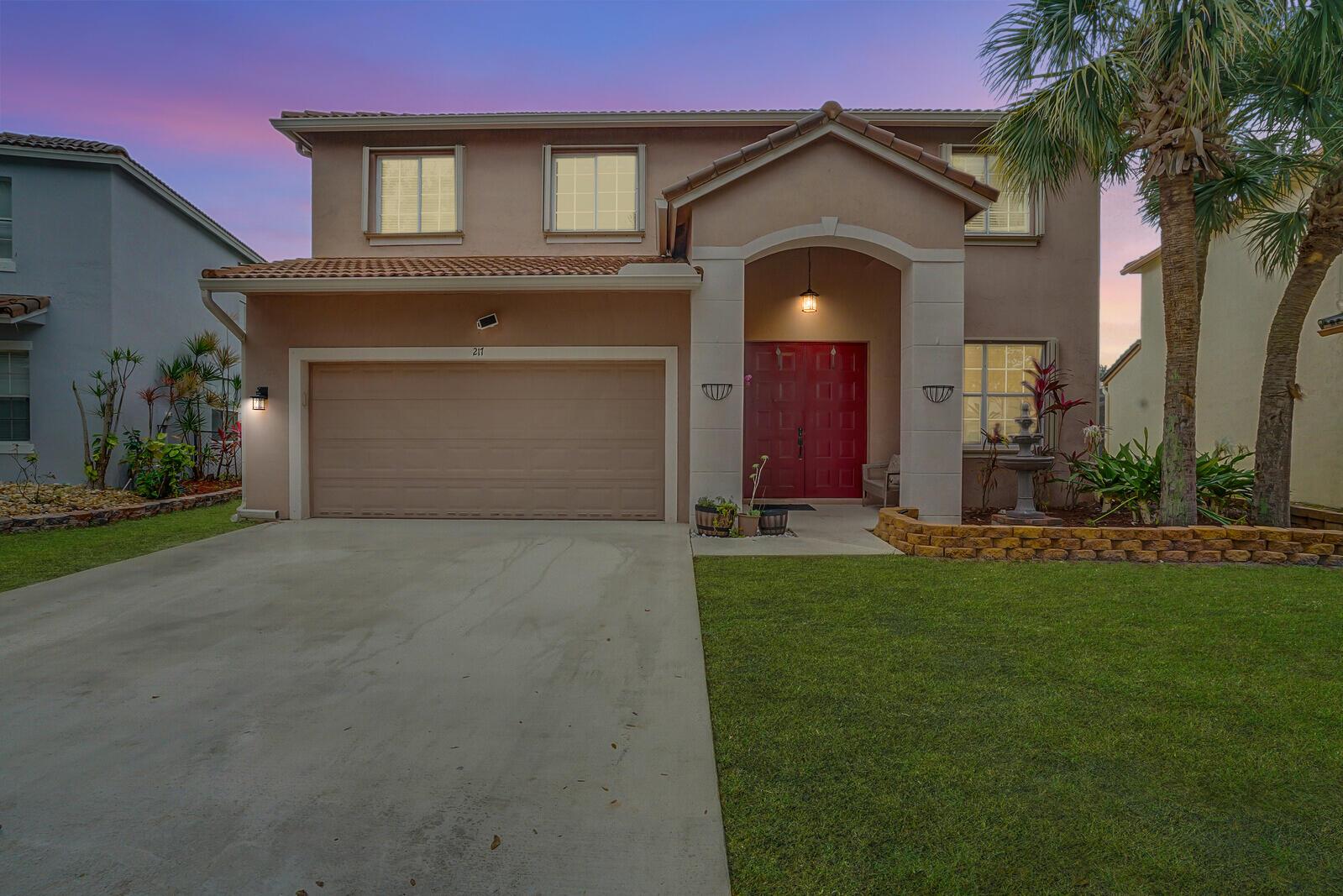 Welcome home to this charming Mediterranean-style home nestled in the desirable gated  Seminole Estates neighborhood of Royal Palm Beach. This spacious home, built in 2002, offers 2,565 square feet of living space, featuring 4-bedrooms & 2.5-bathrooms PLUS a large loft. The interior boasts a welcoming foyer, a pantry for ample storage, volume ceilings that enhance the open feel, and walk-in closets providing generous space. The spacious kitchen includes stainless steel appliances, lots of cabinets for storage, and a large breakfast nook. Situated on a oversized waterfront lot, the property offers a comfortable outdoor area for relaxation or entertainment. Large screened patio area! Low HOA fees and great amenities for all residents to enjoy! Great schools, restaurants, & shopping nearby.