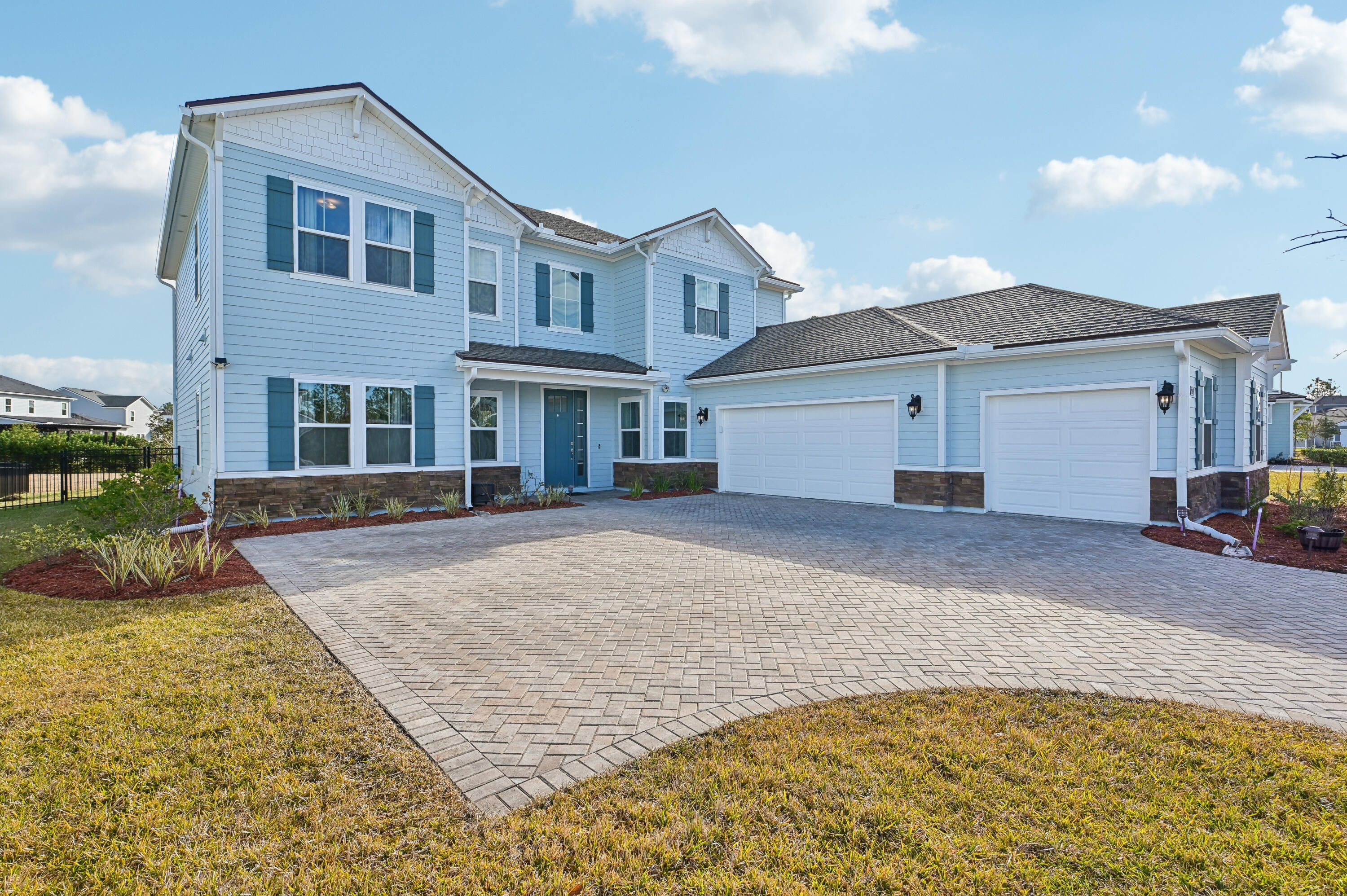 Desirable first phase WIDER LOT with spacious floor plan and dedicated/ separate office in this like-new 3yr old home and EXPANSIVE PRESERVE backyard VIEWS vs. those currently offered that have privacy fences, smaller yards and are backed up directly to other homes or main road.The 57 Sunset Ridge experience is one of tranquility and truly spacious luxury living. This residence is the Bartram model built 3 years ago by #1 rated luxury builder, Toll Brothers, with the upstairs master, the only such model in the highly regarded Bartram Ranch community. This meticulously maintained home built in 2022 features an more oversized and private. Also, it's ready to accommodate your furry friends, since it's completely fenced. Natural light from the east fills the home and kitchen areas perfectly in the morning and sunsets viewed from the loft are simply dreamy. The 3 car garage is an upgraded 5 foot push-out side entry oversized one, meaning beyond the extra space and the gorgeous polished concrete floors...you also have an estate size driveway and palatial feel to elegantly greet your guests.  Can you believe the low HOA of only $128/ month gets you access to the resort styled pool, clubhouse, gym, play area and more? Approximately 5 minutes drive to restaurants/ shopping, and only 3 minutes drive from the Saint Johns River. Put down roots where the weather allows for year round outdoor fun and the schools are #1 rated in all of Florida...right here in beautiful, warm and welcoming St. Johns County!
