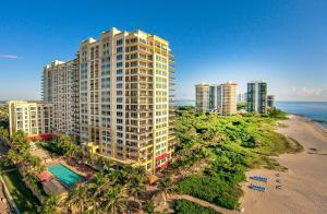 High floor, modern, fully furnished 2/2 residence w/preferred unobstructed views facing NE. Adjacent to Ocean Reef Park with expansive views of ocean, Intercoastal and park. Beautifully furnished marble flooring and baths, granite kitchen with breakfast area, with washer/dryer. This Resort Hotel/Condo is on the beach and has two pools, outdoor whirlpools, a full-service spa, three restaurants, a fitness center, concierge services, children's center and valet parking. The Resort is a luxurious retreat and turnkey investment property! An owner can choose to utilize the Marriott rental program, rent out independently or through an agent.. No minimum rental periods, even renting for one day is OK!. Great rental history in most popular one of a kind resort on Singer Island. Some stock photos.