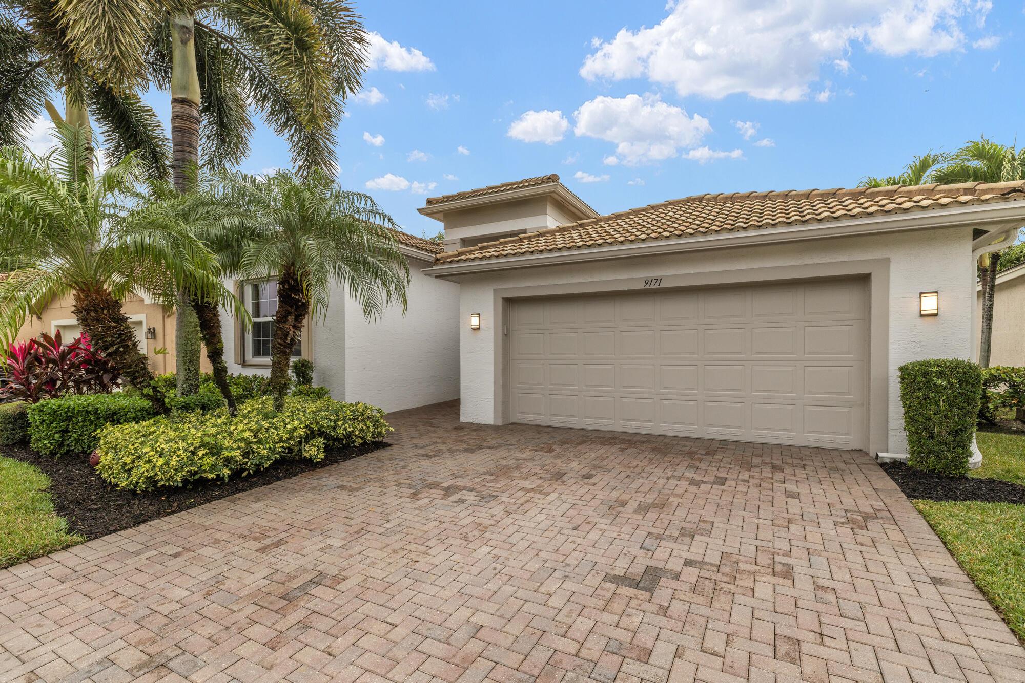 This stunning single-family home is the crown jewel of the neighborhood. Featuring a welcoming entryway, this home boasts an open-concept layout with a large island, tasteful cabinetry, and a dedicated study space. Gorgeous light fixtures throughout. The flex room offers the ability for a third bedroom. Freshly painted with updated flooring and custom built-ins in the master closet, it's move-in ready. Plantation shutters for a stylish touch. Extended screened patio is perfect for outdoor relaxation, complemented by accordion shutters. Enjoy all the amenities Valencia Reserve offers despite clubhouse renovations, most amenities remain accessible in this vibrant 55+ community. Pickleball courts, pools, cafe, theatre, games room, fitness center. Short walk or drive to the clubhouse.