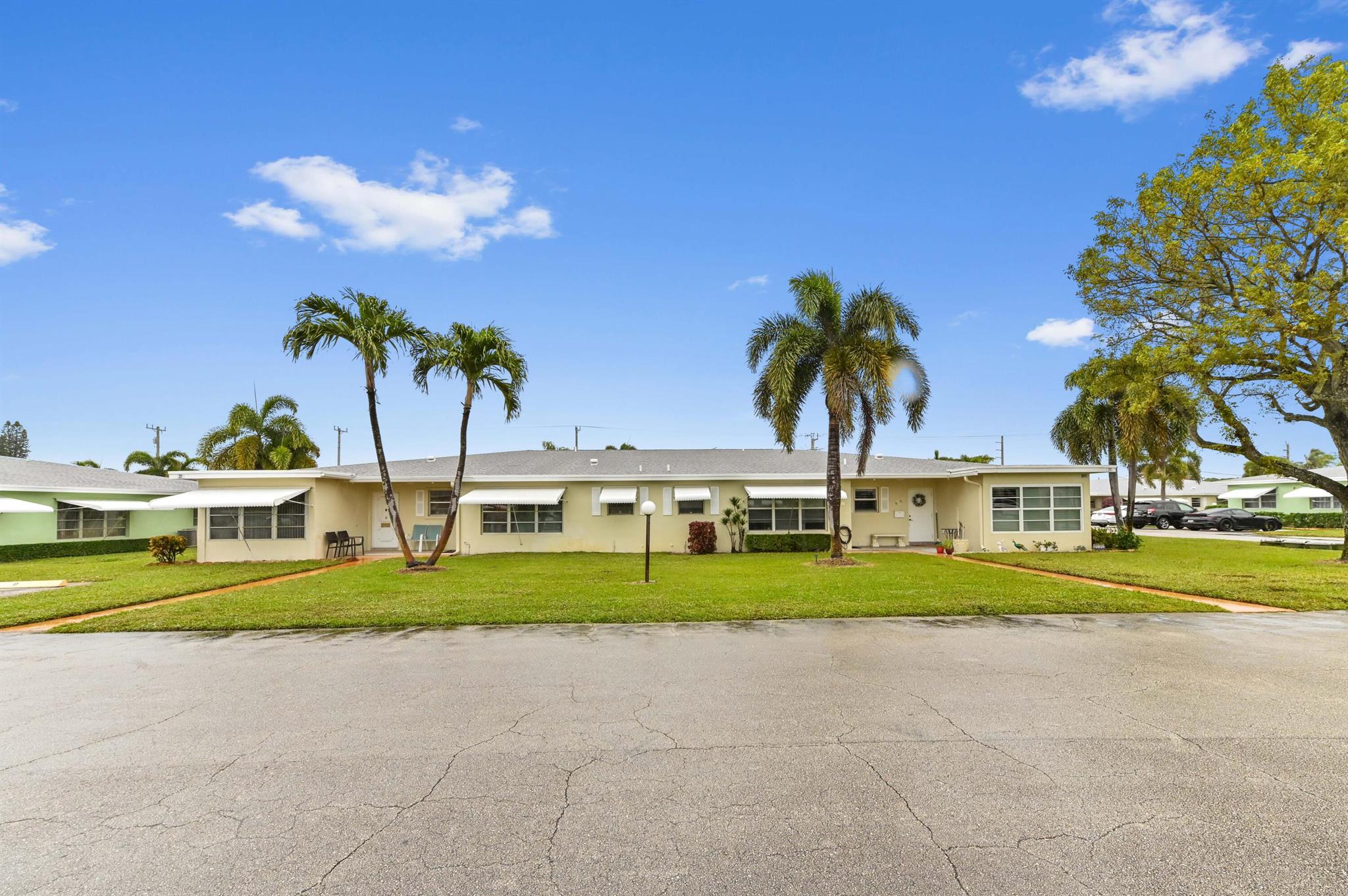 Welcome to this charming 2-bedroom, 2-bathroom villa located in the desirable 55+ community of Pine Point Villas in Boynton Beach. From the moment you arrive, the front open porch invites you to relax and soak up the Florida sunshine. Inside, the combined living, dining, and kitchen areas create a cozy and connected living space, perfect for entertaining or enjoying quiet moments at home. The updated extended kitchen offers ample cabinet space, making meal preparation a breeze.The thoughtful bedroom layout provides privacy and functionality. The master bedroom features a spacious walk-in closet and an ensuite bathroom for your convenience, while the second bedroom is ideal for guests or as a home office. Step outside to enjoy a spacious backyard, perfect for gardening, outdoor relaxation, or entertaining friends and family.

Pine Point Villas is a well-maintained community offering a variety of resort-style amenities to enhance your lifestyle. With its prime location just minutes from fine shopping, dining, and beautiful beaches, this condo delivers the best of South Florida living. Don't miss the opportunity to call this peaceful retreat your new home!