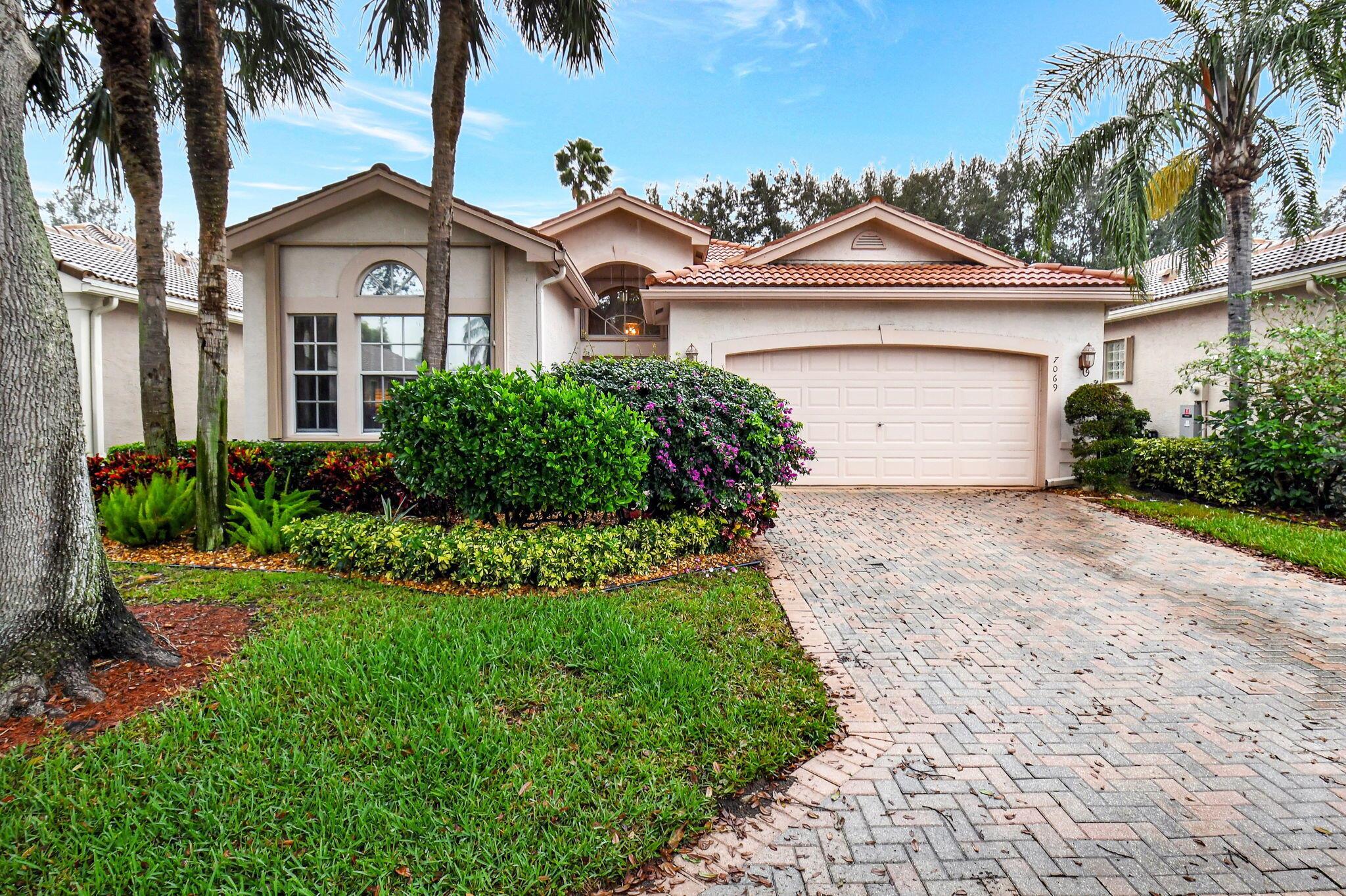 WARM & INVITING MEDITERRANEAN MODEL WITH ACCORDION SHUTTERS & A PRIVATE BACKYARD.  THE A/C UNIT WAS REPLACED 9/2021.  THERE ARE NEUTRAL TILES ON THE DIAGONAL IN THE MAIN LIVING AREAS.  THE KITCHEN HAS WOOD CABINETS WITH PULL-OUTS, GRANITE COUNTERTOPS, TILE BACKSPLASH & A BREAKFAST NOOK.  THE FAMILY ROOM HAS RECESSED LIGHTS, CEILING FAN & STACKING SLIDERS DOORS WHICH LEADS OUT TO THE COVERED, EXTENDED & SCREENED-IN LANAI.  THE PRIMARY BEDROOM HAS DUAL WALK-IN FITTED CLOSETS, TRAY CEILING WITH CEILING FAN & AN ENSUITE WITH DUAL SINKS, WALK-IN SHOWER AND SOAKING TUB.  THERE ARE TWO GUEST BEDROOMS, ONE OF WHICH HAS POCKET DOORS & DUAL CLOSETS.  THE CLUBHOUSE RENOVATION IS SCHEDULED TO RE-OPEN IN LATE MARCH!  ALL MEASUREMENTS & INFORMATION IS DEEMED ACCURATE & SHOULD BE INDEPENDENTLY VERIFIED.