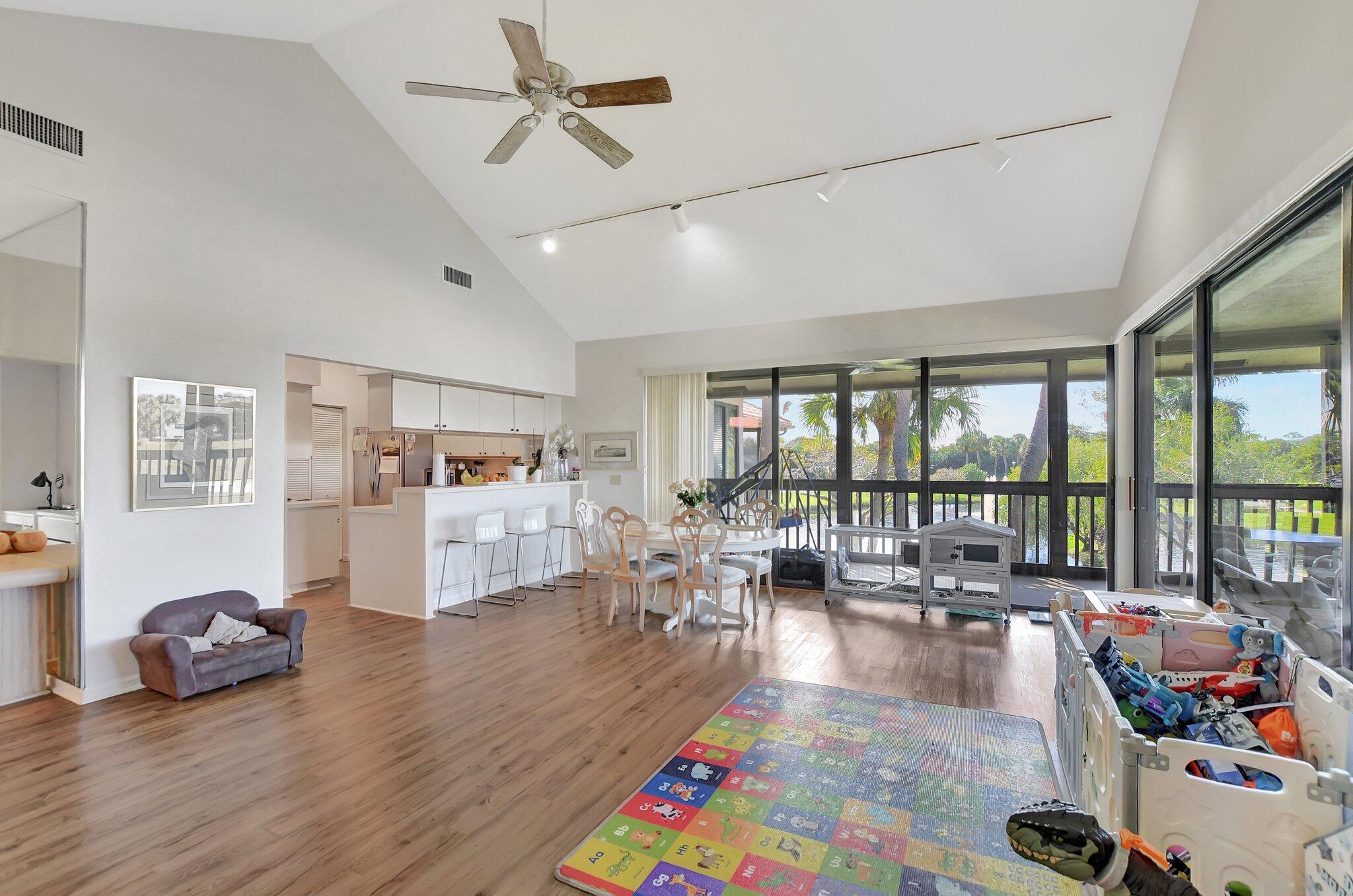 This open and airy second-floor condo at Boca West Country Club is filled with natural light, offering fabulous views of the water and golf course from every room. The desirable split floor plan and generously sized living room make this a perfect place to call home.