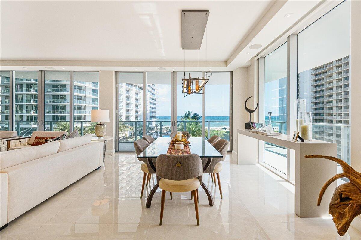 Come enjoy this brand new turnkey residence for your Palm Beach stay! Now being offered for short term rent min 30 days. Enjoy oceanfront sunrises and sunsets over the intracoastal from this 2,525 SF 2 bedroom + den floor- through residence designed by Bob Martin of Decorators Unlimited. The former model, 605 has been meticulously designed offers 900SF of outdoor space on two wraparound terraces. Amrit is Palm Beach's premier resort-style development with unparalleled wellness amenities, as well as four on-site restaurants. Enjoy the conveniences of condo living, with the amenities of a luxury hotel including valet parking, beach service, room service, resort-style pools, concierge and access to a 100,000+ SF spa & wellness facility.