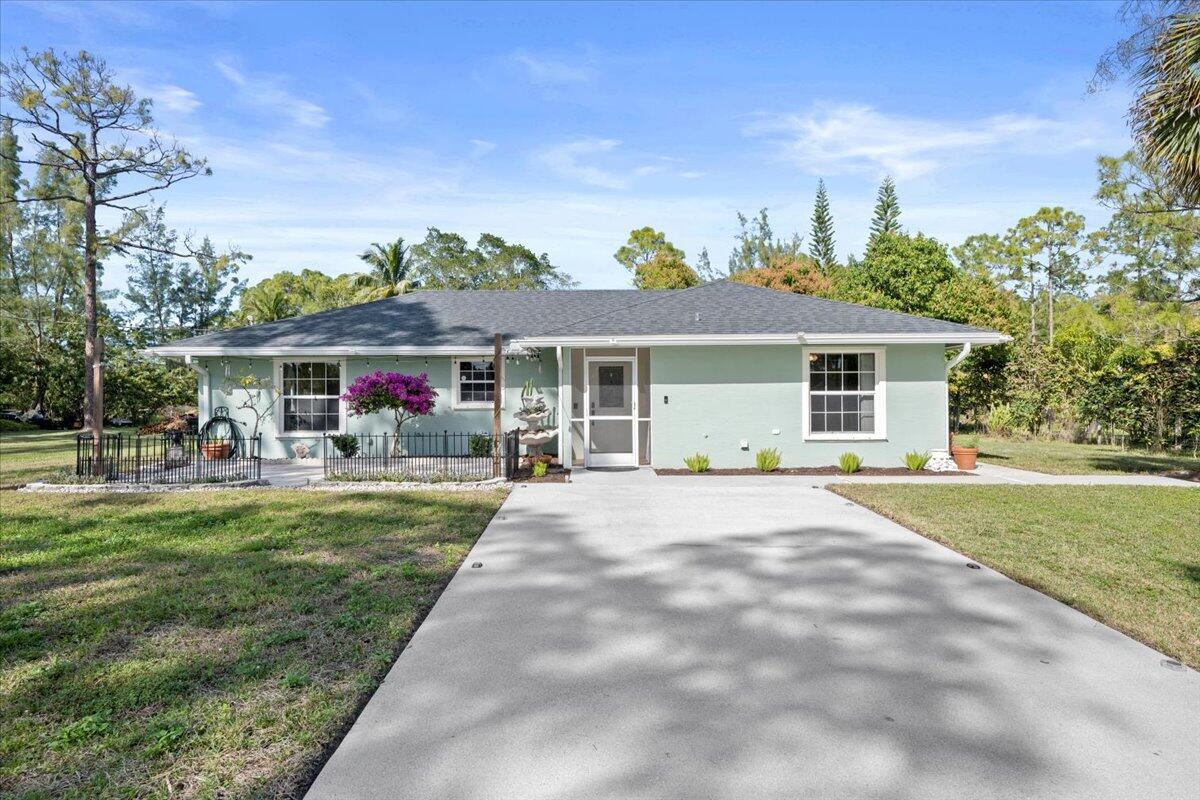 This 3-bedroom, 2-bath CBS home sits on 1.29 partially fenced acres, offering space and versatility. Featuring a split floor plan, 36-inch tile throughout, and updated baths (2018), this home is move-in ready. The modern kitchen boasts granite countertops and stainless steel appliances, while the spacious screened patio is perfect for outdoor living. Recent updates include a new roof (2023), AC (2021), and a new well pump (2019), plus a water softener (2015) for added convenience.With panel hurricane shutters, an expansive concrete driveway, and no restrictions, this property is ideal for RVs, boats, or horses. Located on a quiet dead-end street, it's the perfect blend of tranquility and modern comfort. Don't wait--schedule your tour today!