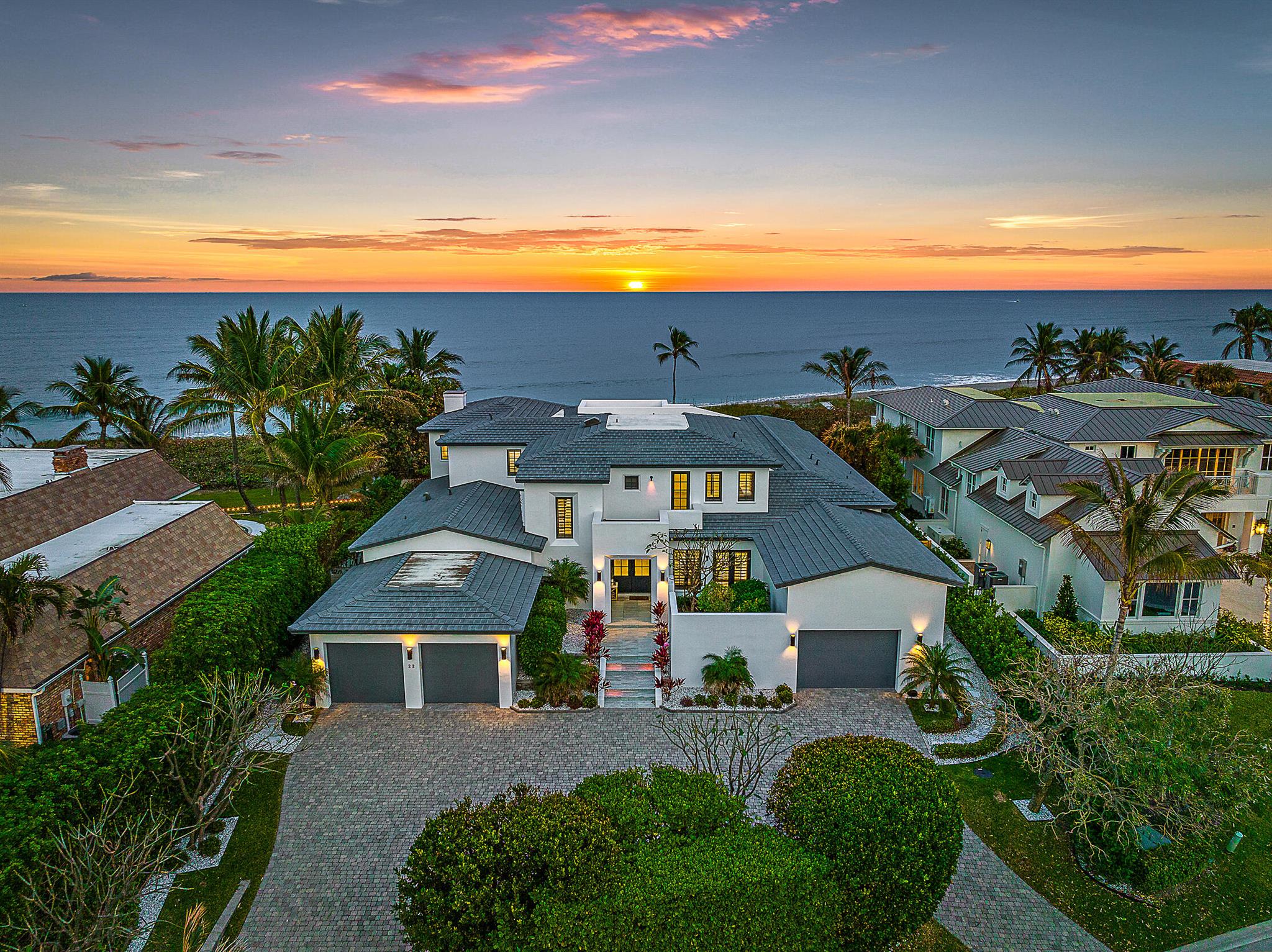 Experience the epitome of luxury living in this contemporary oceanfront masterpiece, currently undergoing a massive renovation set to be completed by the second quarter of 2025. Nestled in the exclusive enclave of Jupiter Inlet Colony, this home offers unparalleled access to the inlet and intracoastal waterways, just steps from your door. This exquisite residence features a lavish master wing designed for ultimate comfort and privacy, extensive entertaining areas perfect for hosting gatherings, crows nest,  and an elevator for seamless access across all levels. The home is equipped with impact windows and doors, ensuring safety and peace of mind. Don't miss the opportunity to own this extraordinary property, where modern elegance meets coastal charm.