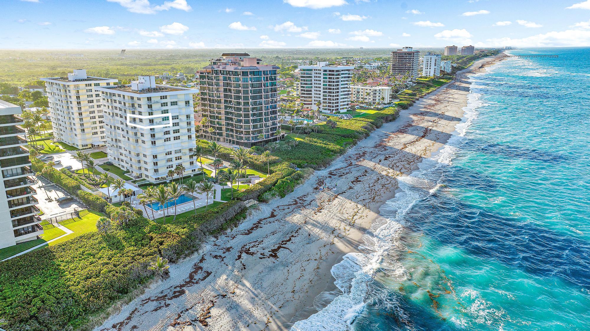 Discover a fully renovated coastal contemporary retreat perched in the most structurally and financially sound oceanfront condominium building on the East coast, Brigadoon of Juno Beach. This exquisite residence boasts two bedrooms, two bathrooms, and a powder room, all thoughtfully designed with a focus on elegance and sophistication. Perfectly positioned in the desirable southeast corner for breathtaking ocean views, and serene sunrises. Step inside to discover warm wood flooring that flows effortlessly through the living spaces, leading to a beautifully custom-designed kitchen. This culinary masterpiece features sleek quartz countertops, premium GE Monogram appliances, a spacious island, abundant storage, and recessed LED lighting. Designed with both style and functionality in this kitchen is a true chef's dream, ideal for creating gourmet meals or entertaining guests in style. Featuring impact windows and solid core doors, this residence showcases a meticulous selection of finishes that seamlessly merge functionality with luxury. A rare highlight of the floor plan is its unique inclusion of both family and living spaces&#x14;an uncommon feature in condo living&#x14;offering exceptional versatility for residents.

Brigadoon stands as a model of financial and structural stability, supported by a 40-year engineering certification and strong reserves. Convenience is prioritized with under building garage parking, ensuring effortless accessibility. Immerse yourself in the essence of coastal living with this harmonious crafted retreat