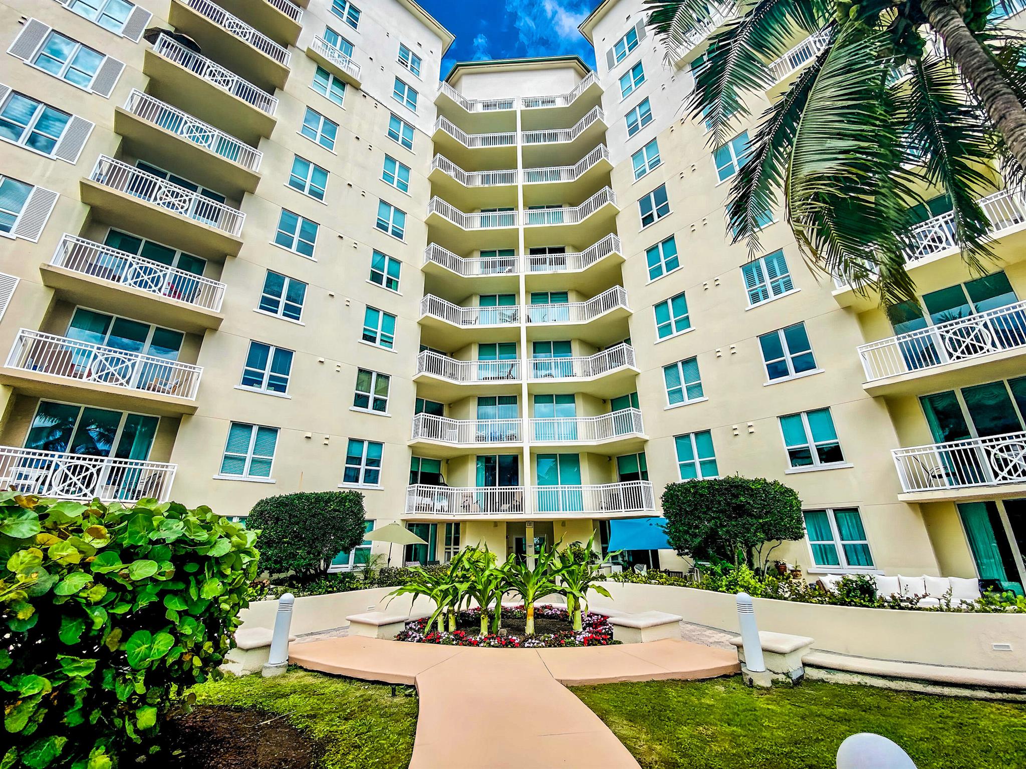 Enjoy your morning coffee with stunning views of the Intracoastal and Atlantic from your balcony in this spacious condo with resort amenities in a premier location. The beach is just over the bridge. Many restaurants are a very short distance. Amenities are: 24/7 attended lobby and valet; concierge services available. Assigned parking in private garage. Private beach club with shuttle service Tropically landscaped pool deck with Olympic-length lap pool, plus a beach entry pool; whirlpool spa and putting green. Elegant Residents Club with bar and catering,  kitchen,  fully equipped fitness center for strength training. This is Florida living in style!