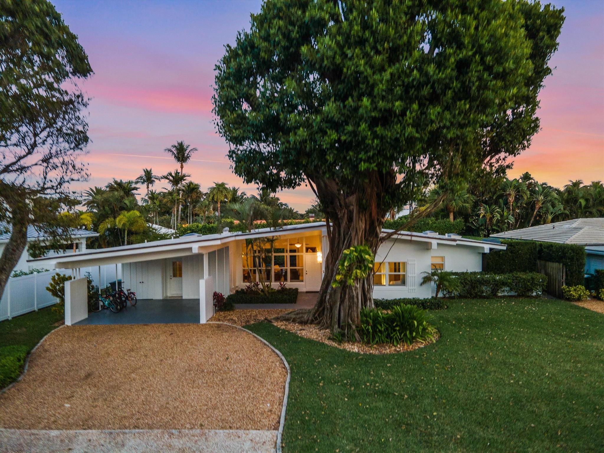 Just steps from the private, secured beaches of Jupiter Inlet Colony, this one-level Mid-Century coastal retreat sits on a prime interior lot, offering both charm and opportunity. Fully furnished and turnkey, this CBS-constructed home features 3 bedrooms, 2 baths, and an open floor plan where the kitchen seamlessly connects to the dining and living areas. With soaring volume ceilings, exposed beams, and all-impact windows and doors, the home is designed for both style and security. Outside, a lushly landscaped backyard oasis awaits, complete with a private pool enveloped by greenery. Offered at land value and sold as-is.  This property presents a rare chance to build new or renovated in one of the most coveted beachside communities. This property presents a rare chance to build new or renovated in one of the most coveted beachside communities.
Surrounded by the Atlantic Ocean, Intracoastal Waterway, and Jupiter Inlet, this hidden gem on Jupiter Island features 240 exclusive single-family residences with a 24-hour private police department and dedicated beach access. Residents enjoy a secluded coastal lifestyle with pristine beaches, world-class fishing and snorkeling, an optional Beach Club membership, a private marina, and a yacht club. All just minutes from top-tier shopping and dining.  Don't miss this rare opportunity to own in Jupiter Inlet Colony&#x14;one of South Florida's best-kept secrets!