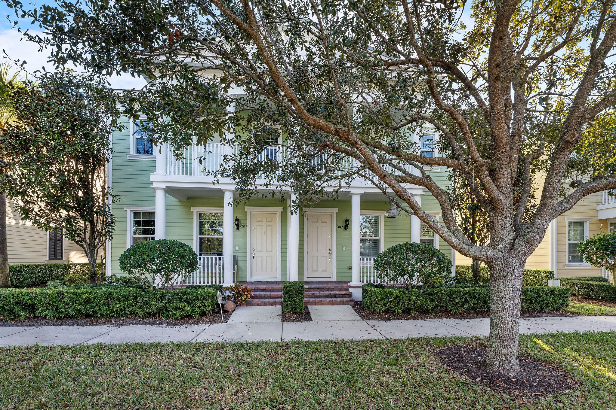 Experience luxury living in this bright and spacious, contemporary 3-bedroom, 2.5-bath townhome in Abacoa's most desirable community. Located on a wide street with a kids' park and playground directly across the street, this home features an expanded kitchen with deep-toned wood cabinets, a large center island, granite countertops, custom backsplash, and upgraded stainless steel appliances. Enjoy outdoor entertaining in the paved courtyard, relax on the balcony, and feel secure with hurricane glass windows throughout. Freshly painted, brand new carpet, wood flooring, designer fixtures, plantation shutters, a 2-car garage plus room for 2 in the driveway, and A-rated schools make this family-friendly home a must-see. Absolutely move in ready condition.