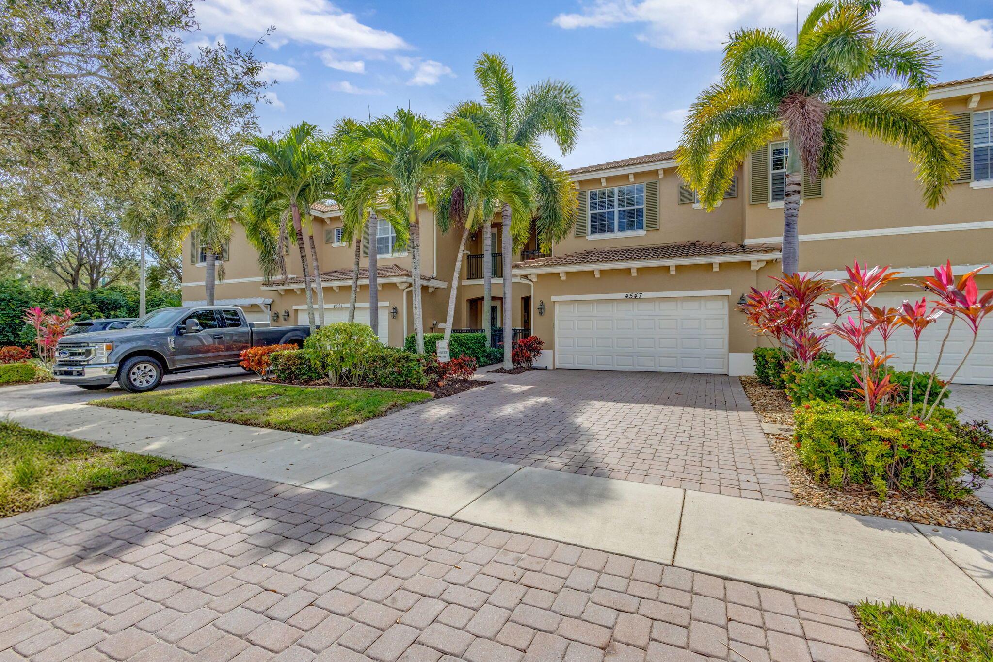 Elegant 3-Bedroom + Den Townhome in Prestigious Gated Community-Priced to Sell! Discover this beautifully maintained 3-bedroom + den, 3-bathroom townhome in a highly sought-after gated community in Palm Beach Gardens. With a freshly painted interior, this home offers the perfect blend of style, comfort, and convenience. Step inside to an open-concept living space featuring granite countertops in the kitchen, tile flooring throughout, and wood floors in the bedrooms. The den provides the flexibility to be used as a fourth bedroom, office, fitness room, or guest space. Enjoy the ease of an in-unit laundry and fiber-optic internet with ethernet connections in every room included- ensuring seamless connectivity throughout the home. The spacious two-car garage adds to the home's convenience, while the private patio offers a perfect outdoor retreat. Low-maintenance living! The HOA covers water, DIRECTV, fiber-optic internet, basic cable, and exterior maintenance-leaving you responsible only for your FPL bill. Located in an exclusive and well-maintained community, you'll be just minutes from stunning beaches, Roger Dean Stadium, high-end shopping, fine dining, and luxury gyms. Plus, for frequent travelers, the airport is just a short drive away. This exceptional home is priced to sell. Don't miss the opportunity to make it yours! Schedule your showing today!