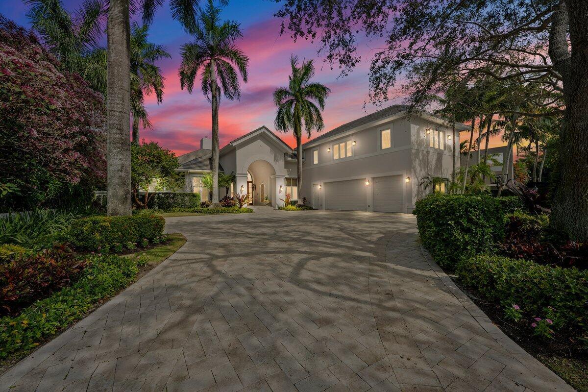 Welcome to this exquisite Mediterranean waterfront estate in the prestigious Admirals Cove community. Boasting 100 feet of prime waterfrontage and a brand-new 50,000 lb-rated boat lift, this home is a boater's paradise with deep-water access. Designed for luxurious living and grand entertaining, this 6-bedroom, 8 full-bath, and 2 half-bath estate offers elegant finishes, soaring ceilings, and breathtaking water views throughout. The expansive layout is perfect for hosting, featuring two grand sitting rooms overlooking the water, a full movie theater, a stately library, and two custom-designed wet bars. The private elevator provides easy access to the movie theater and an executive office with stunning waterfront views. A sprawling screened-in sunroom creates the perfect setting for outdoor gatherings, seamlessly blending indoor and outdoor living. The home is equipped with top-tier amenities, including a 2021 roof, Flow Logic safety water shut-off system, and a home generator connected to gas lines with automatic turn-on for uninterrupted power. The resort-style pool, recently resurfaced, offers a true oasis, while the spacious 3.5-car garage provides ample parking and storage. For added versatility, a private 2-bedroom, 2-bathroom guest apartment complete with a full kitchen, living area, and separate entrance serves as the perfect in-law suite or luxury guest retreat. Situated in one of South Florida's most exclusive waterfront communities, this entertainer's dream home offers unparalleled elegance, comfort, and sophistication.